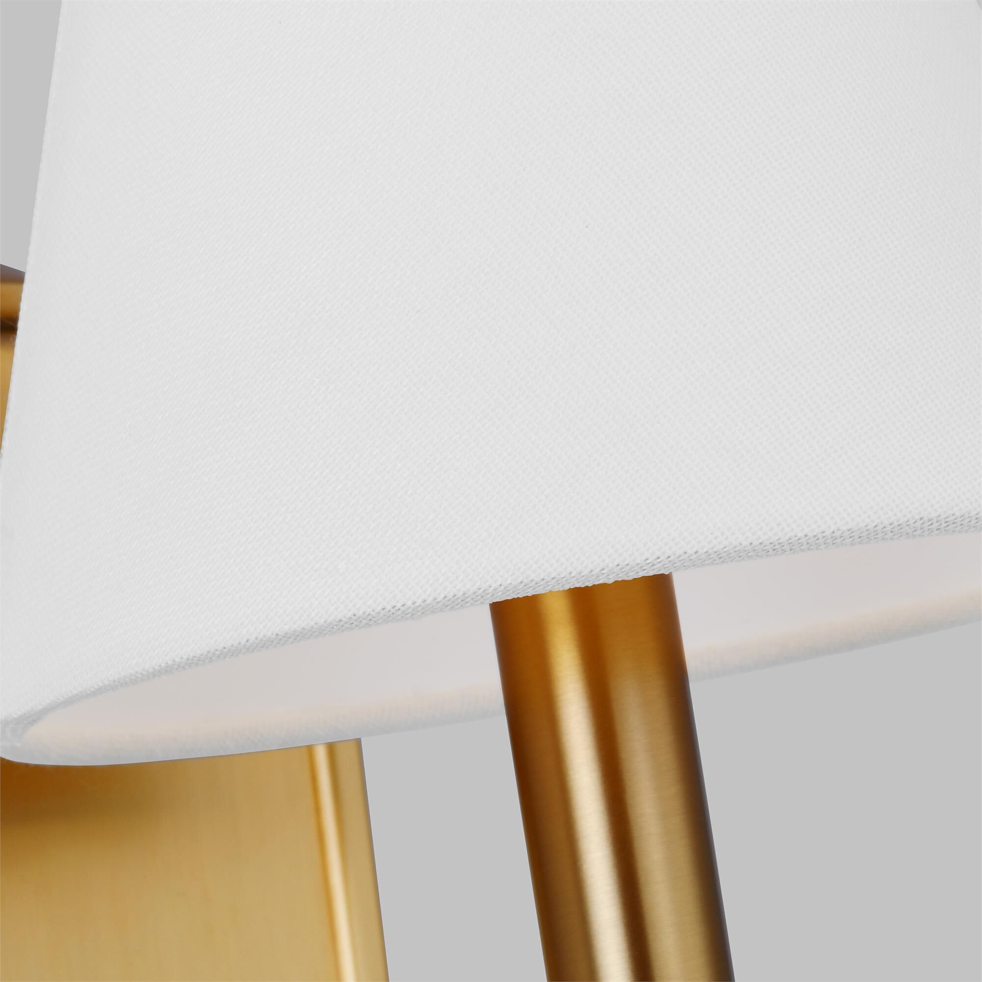 Shown in Burnished Brass finish and White Linen Fabric shade