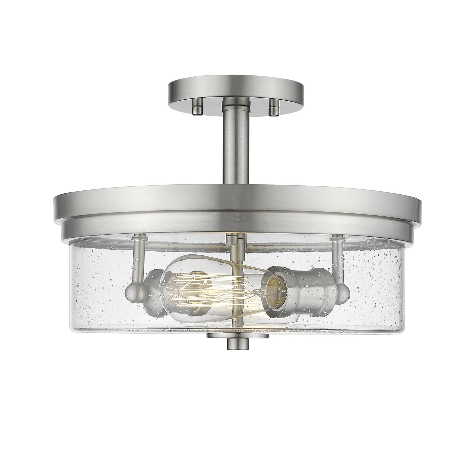 Shown in Brushed Nickel finish and Glass shade