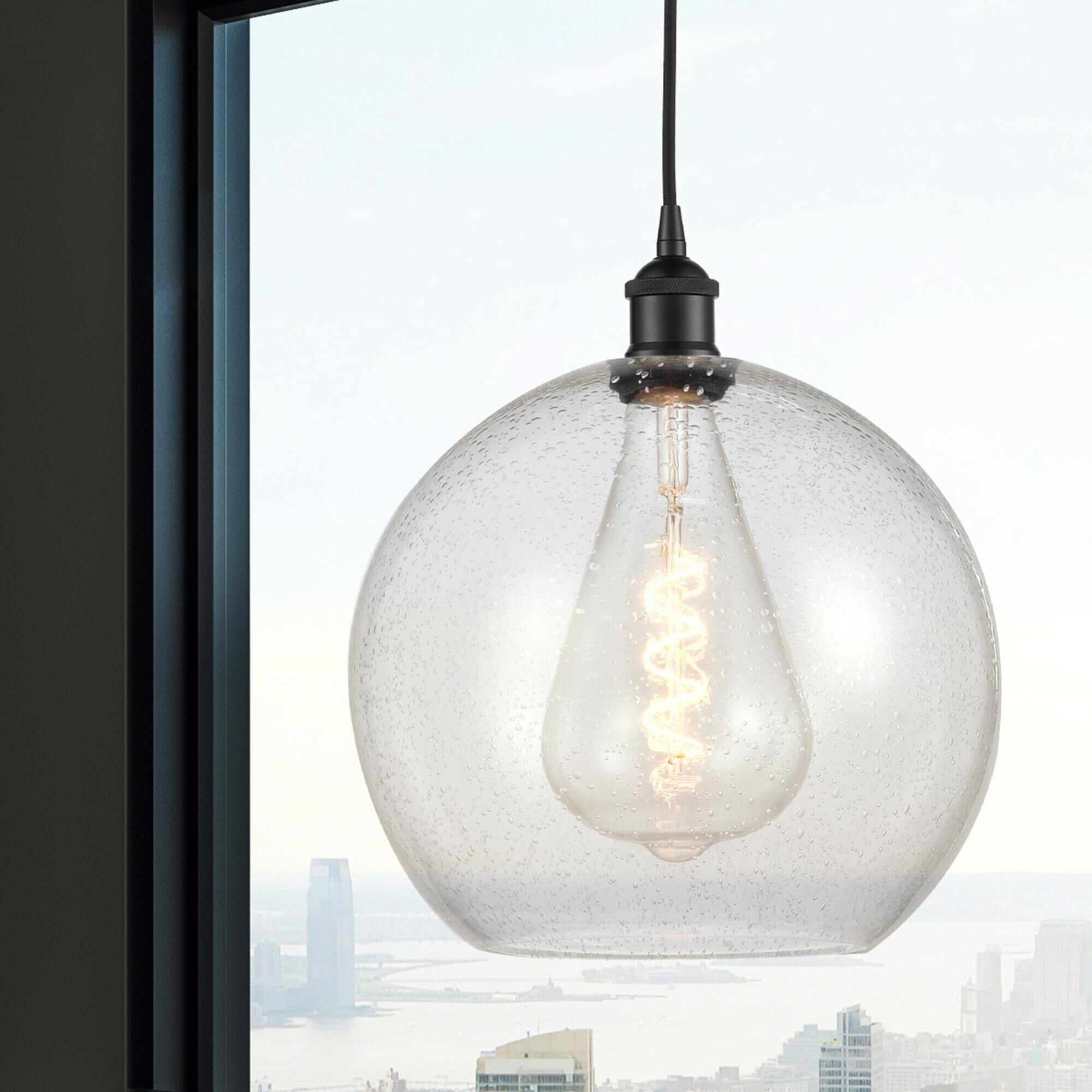 Shown in Matte Black finish and Seedy glass