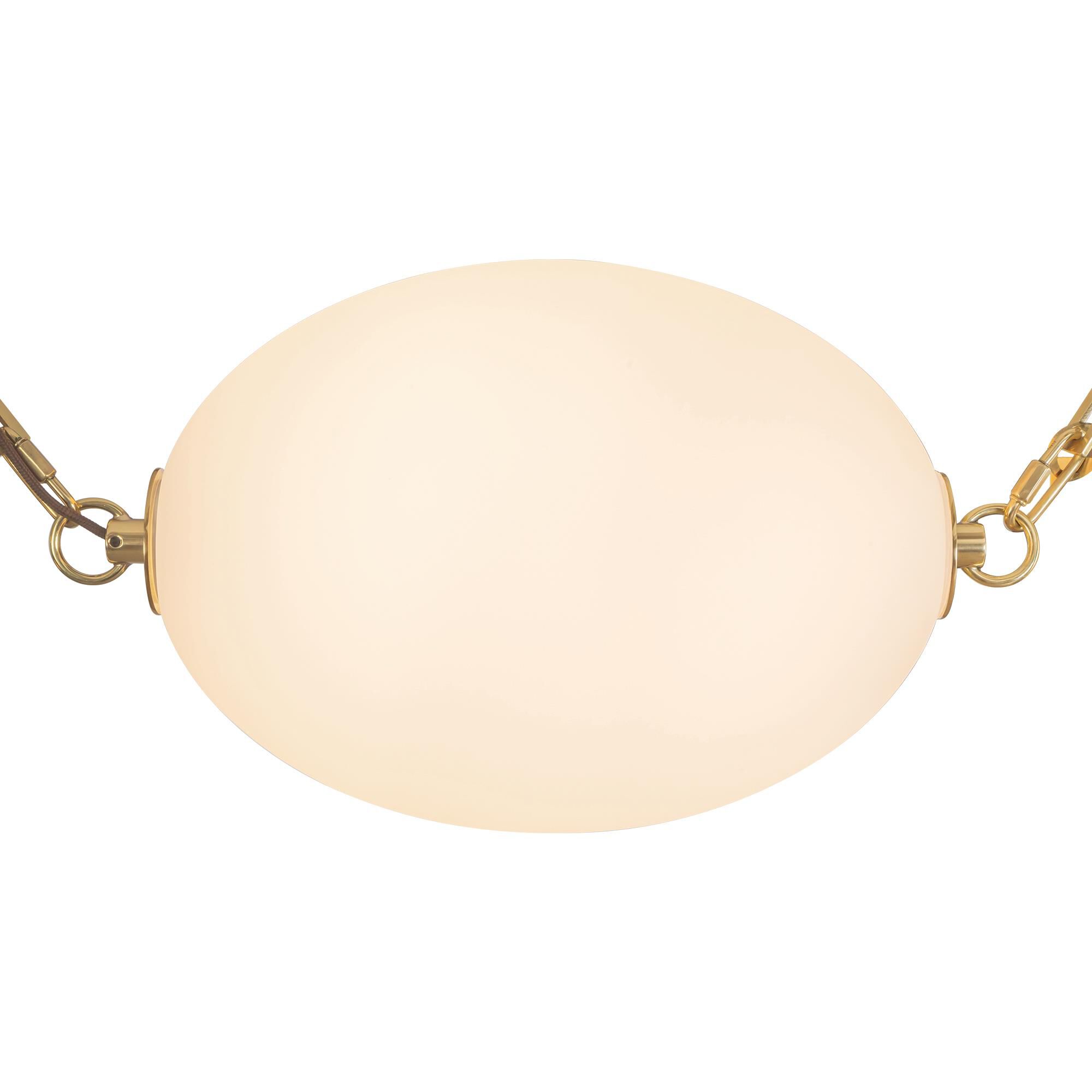 Shown in Patina Brass finish and Opal glass