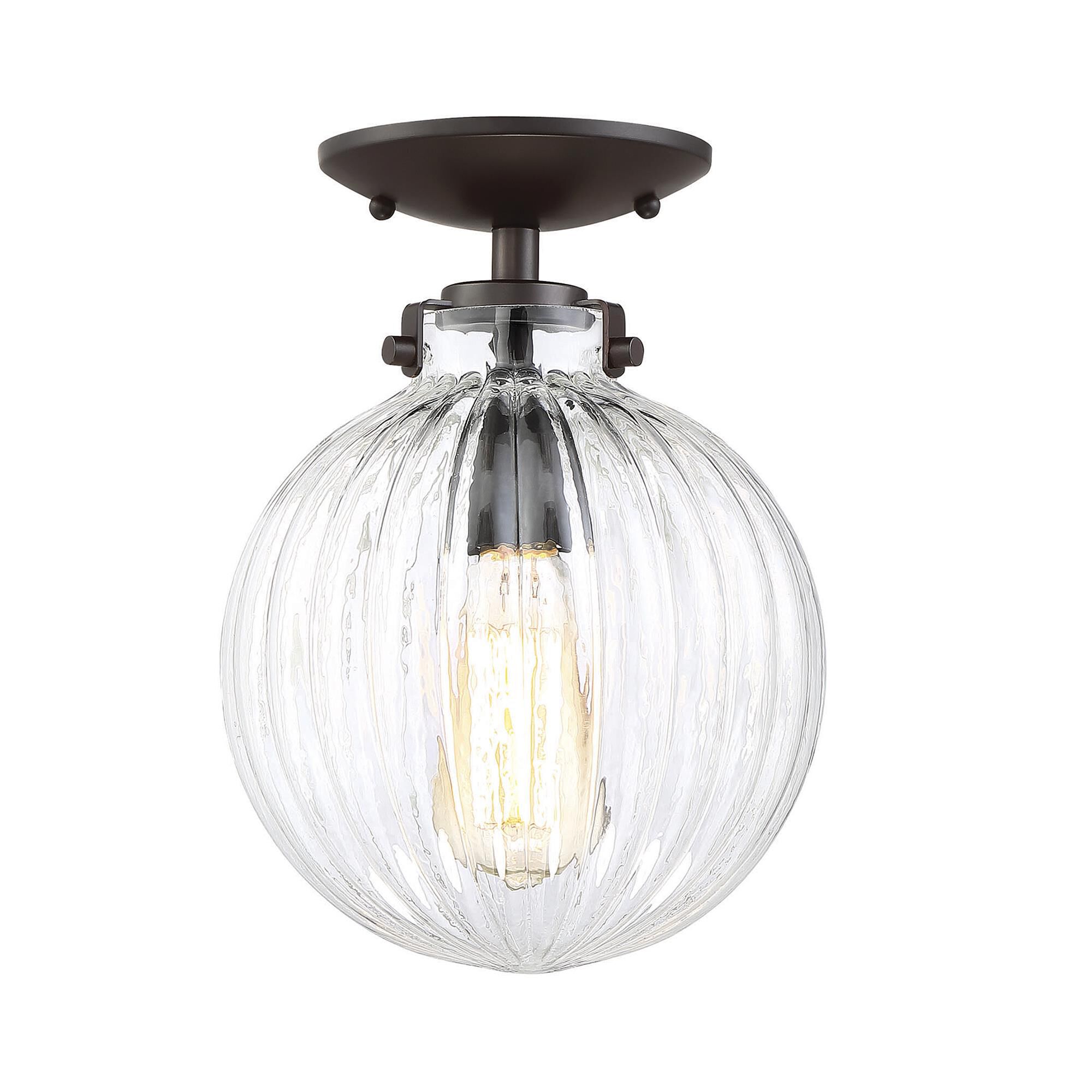 Shown in Oil Rubbed Bronze finish and Clear Ribbed glass