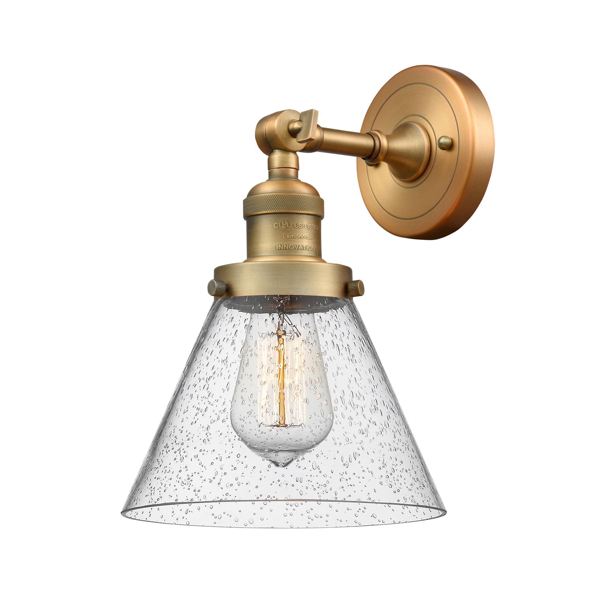 Shown in Brushed Brass finish and Seedy glass