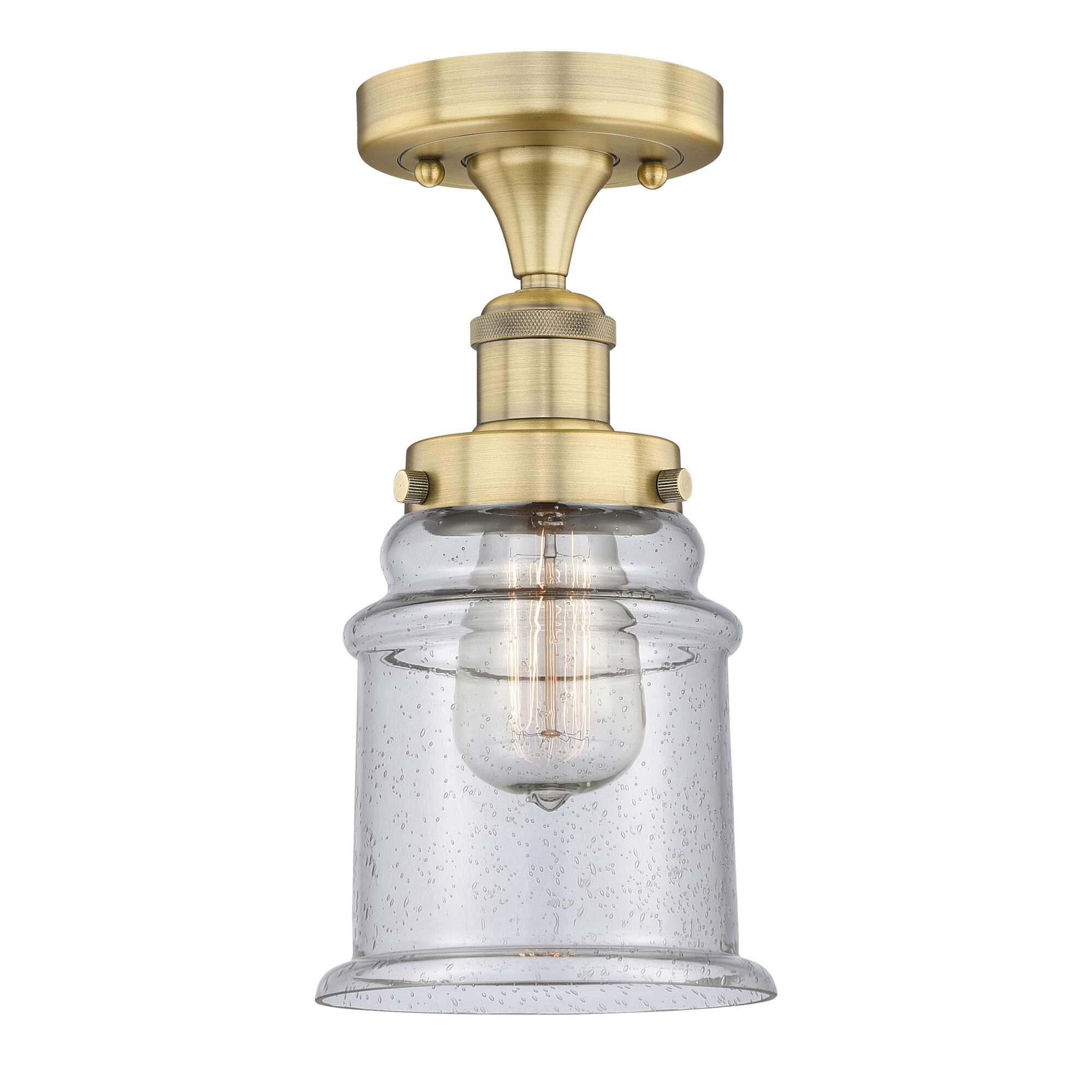 Shown in Brushed Brass finish and Seedy glass