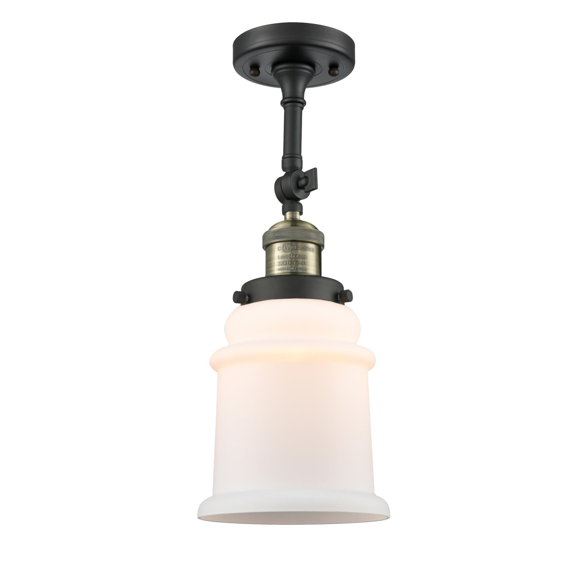 Shown in Black Antique Brass finish and Frosted glass and None accent