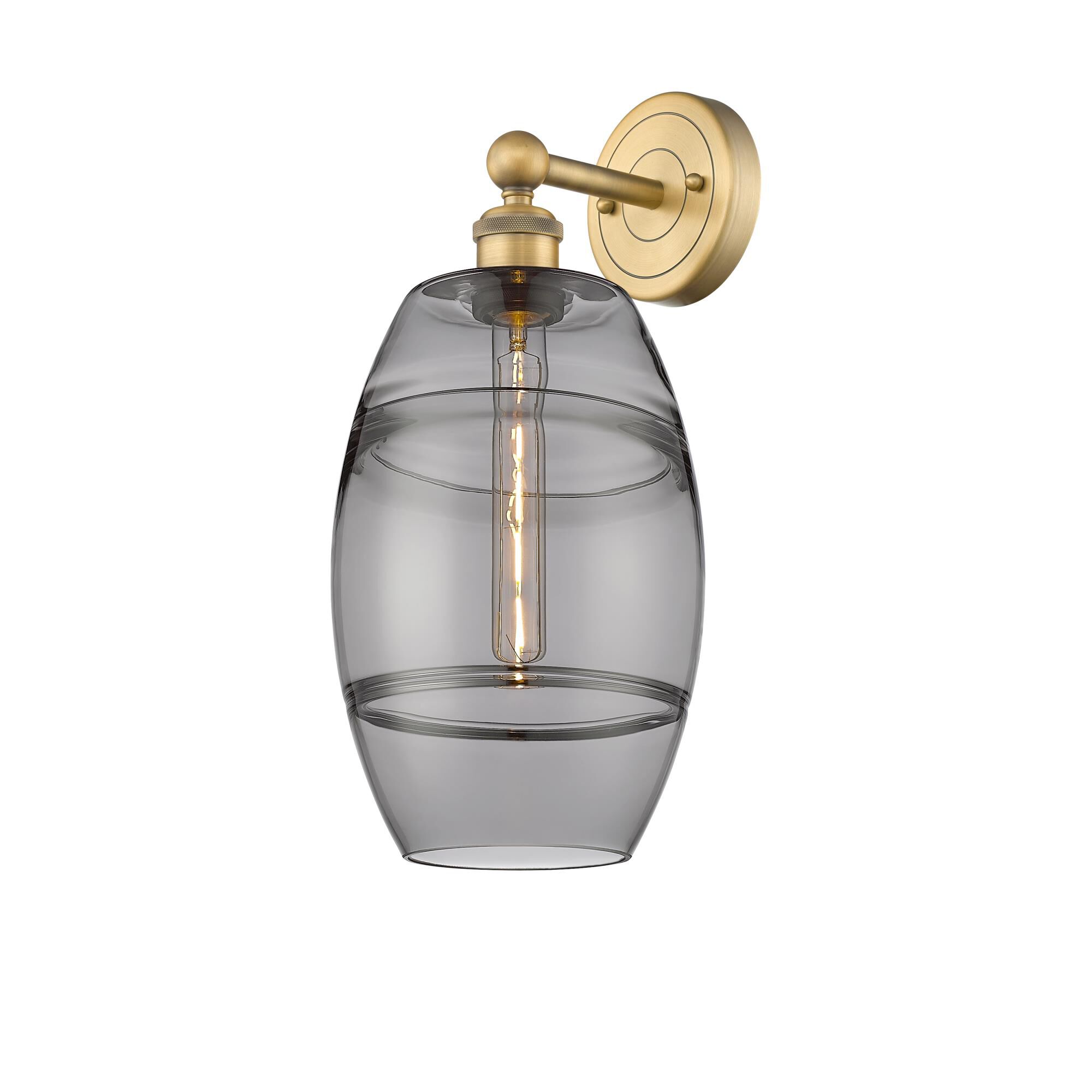 Shown in Brushed Brass finish and Light Smoke glass