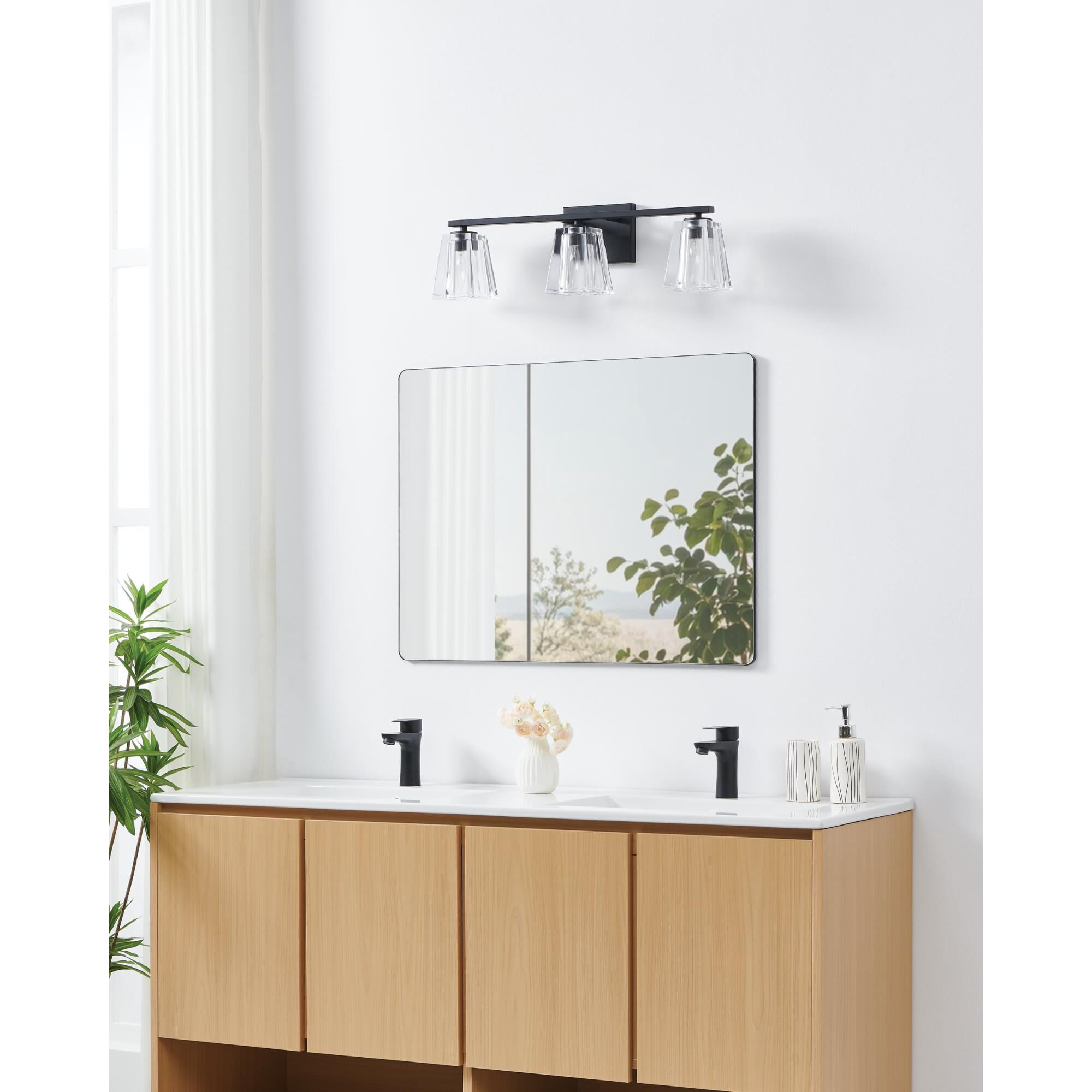 Shown in Matte Black finish and Clear Pressed glass