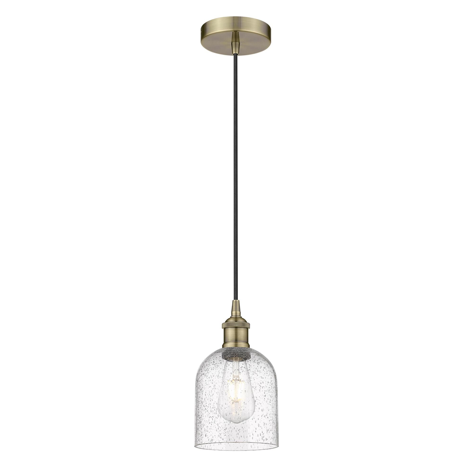 Shown in Antique Brass finish and Seedy glass