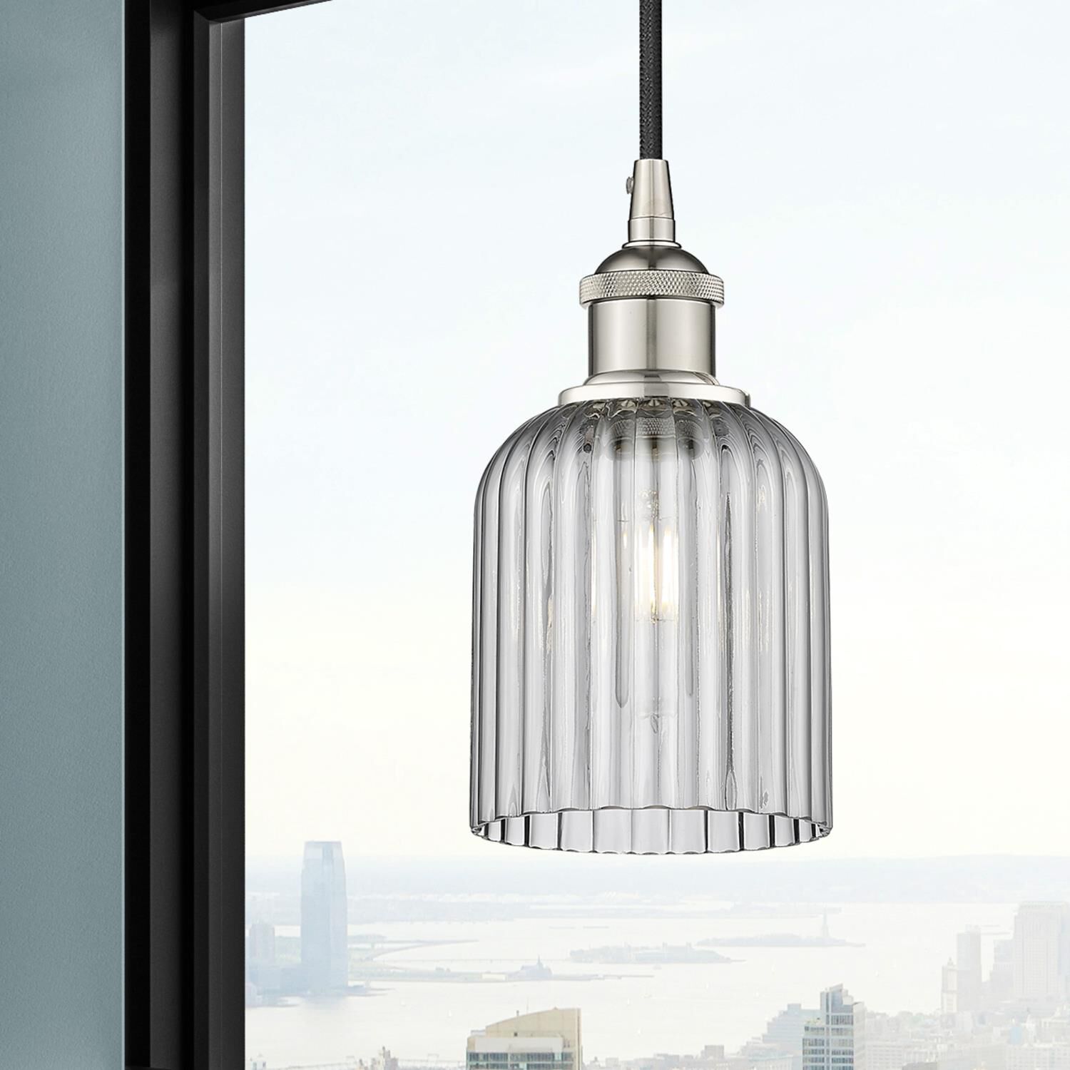 Shown in Polished Nickel finish and Light Smoke glass
