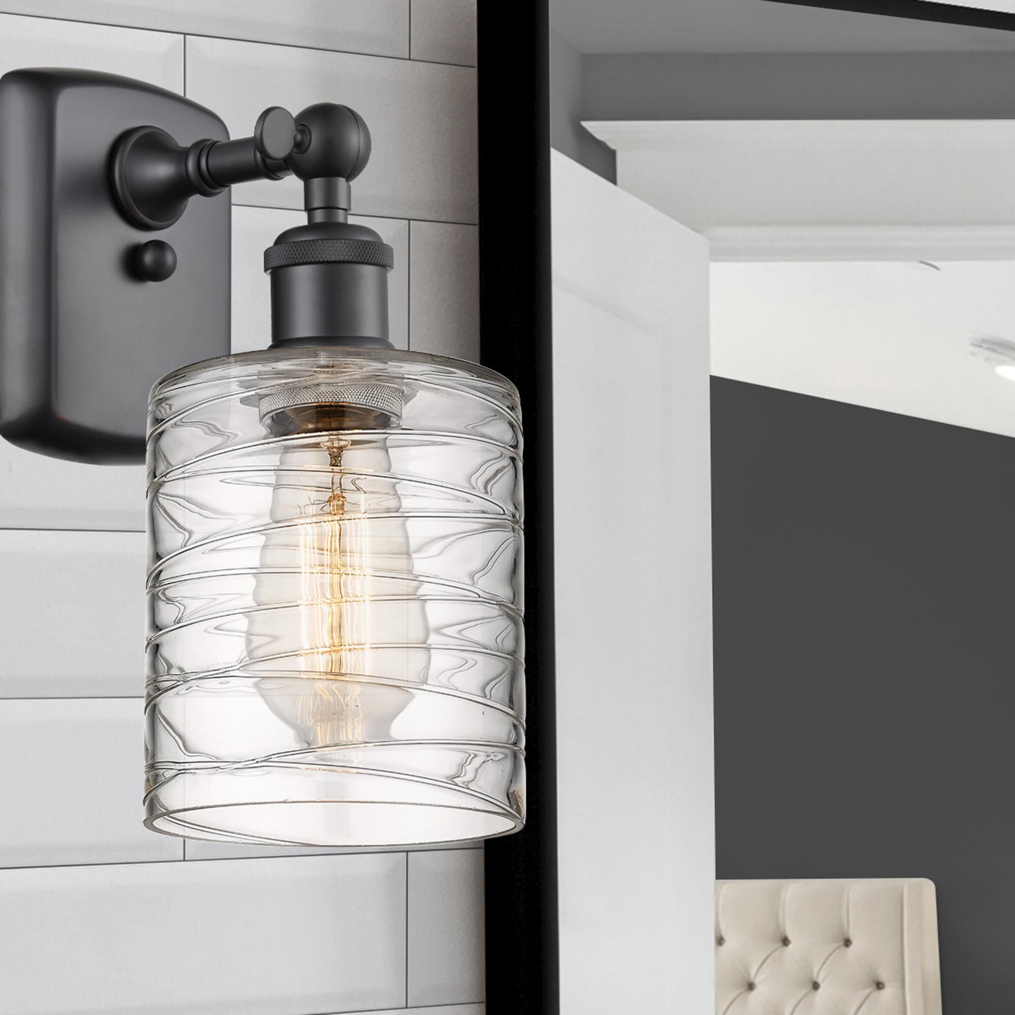 Shown in Matte Black finish and Deco Swirl glass