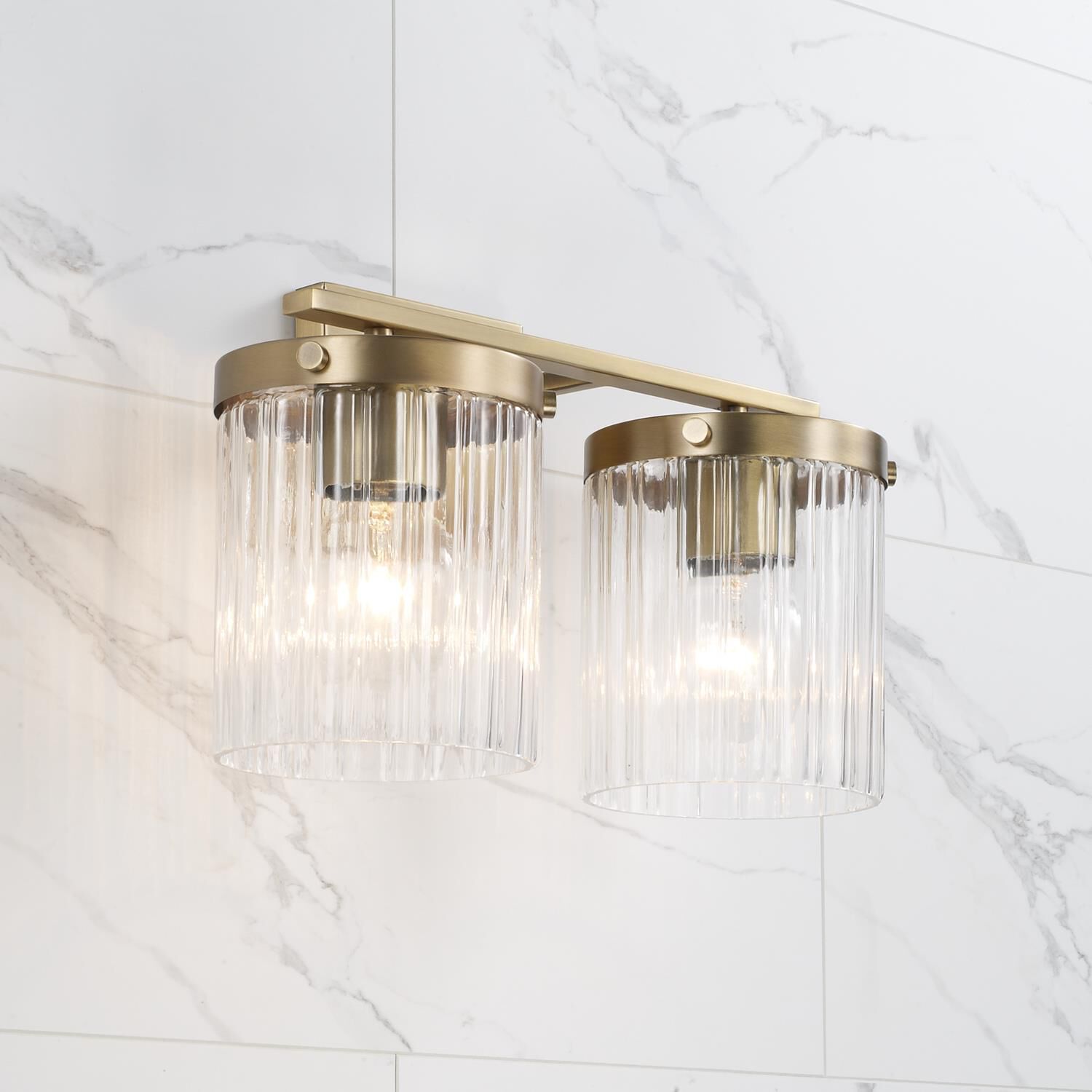 Shown in Aged Brass finish and Beveled Fluted glass