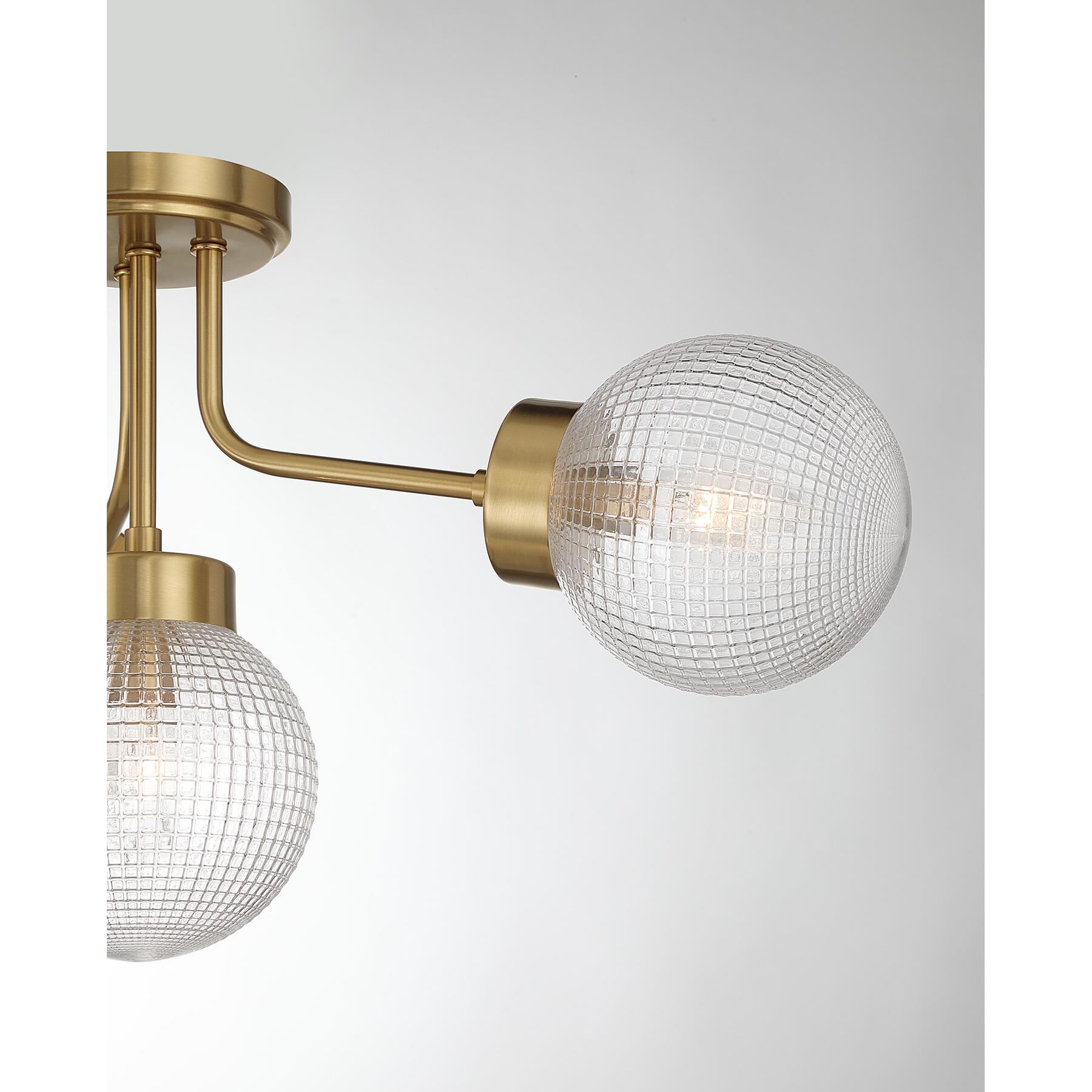 Shown in Warm Brass finish and Clear Textured Matrix glass