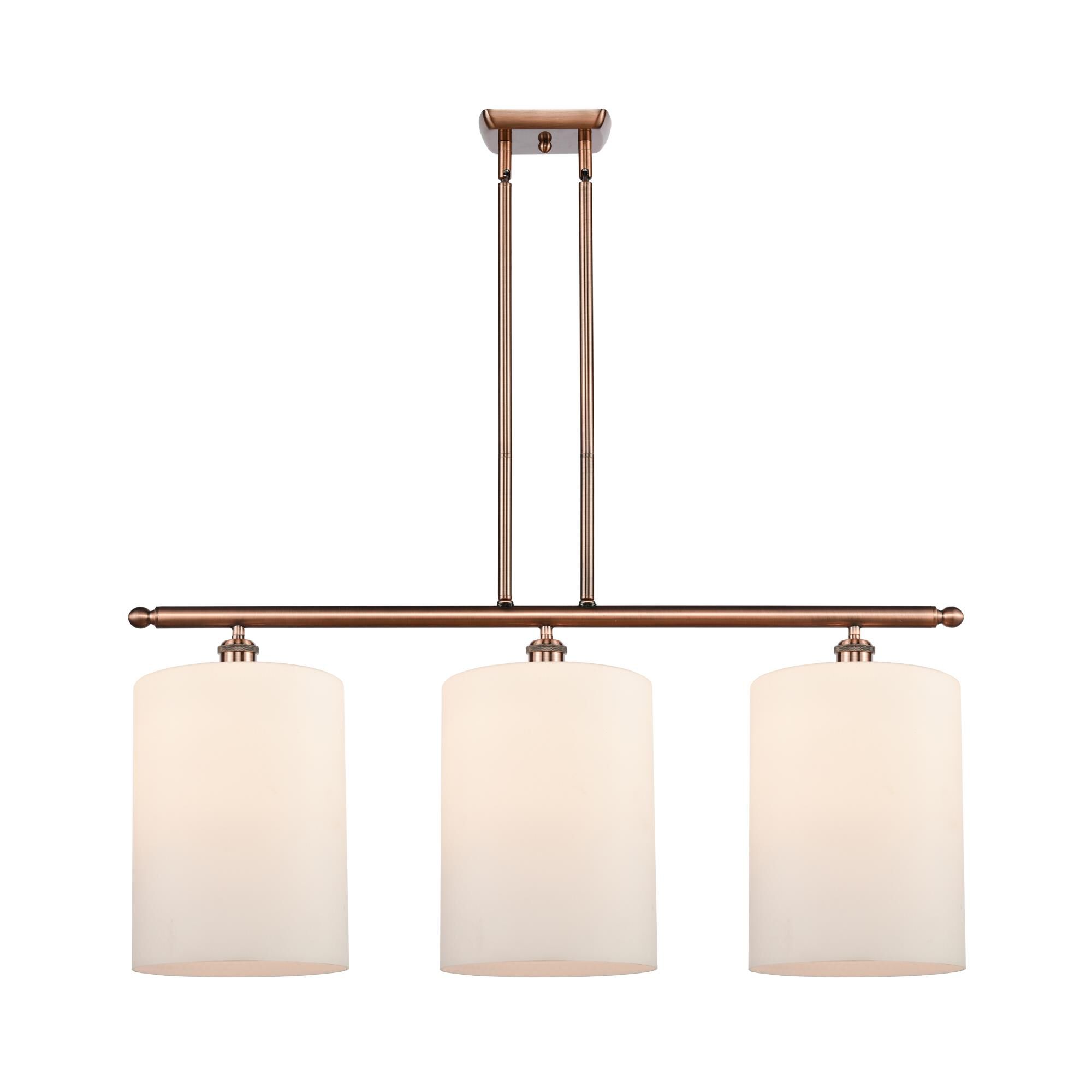 Shown in Antique Copper finish and Matte White glass