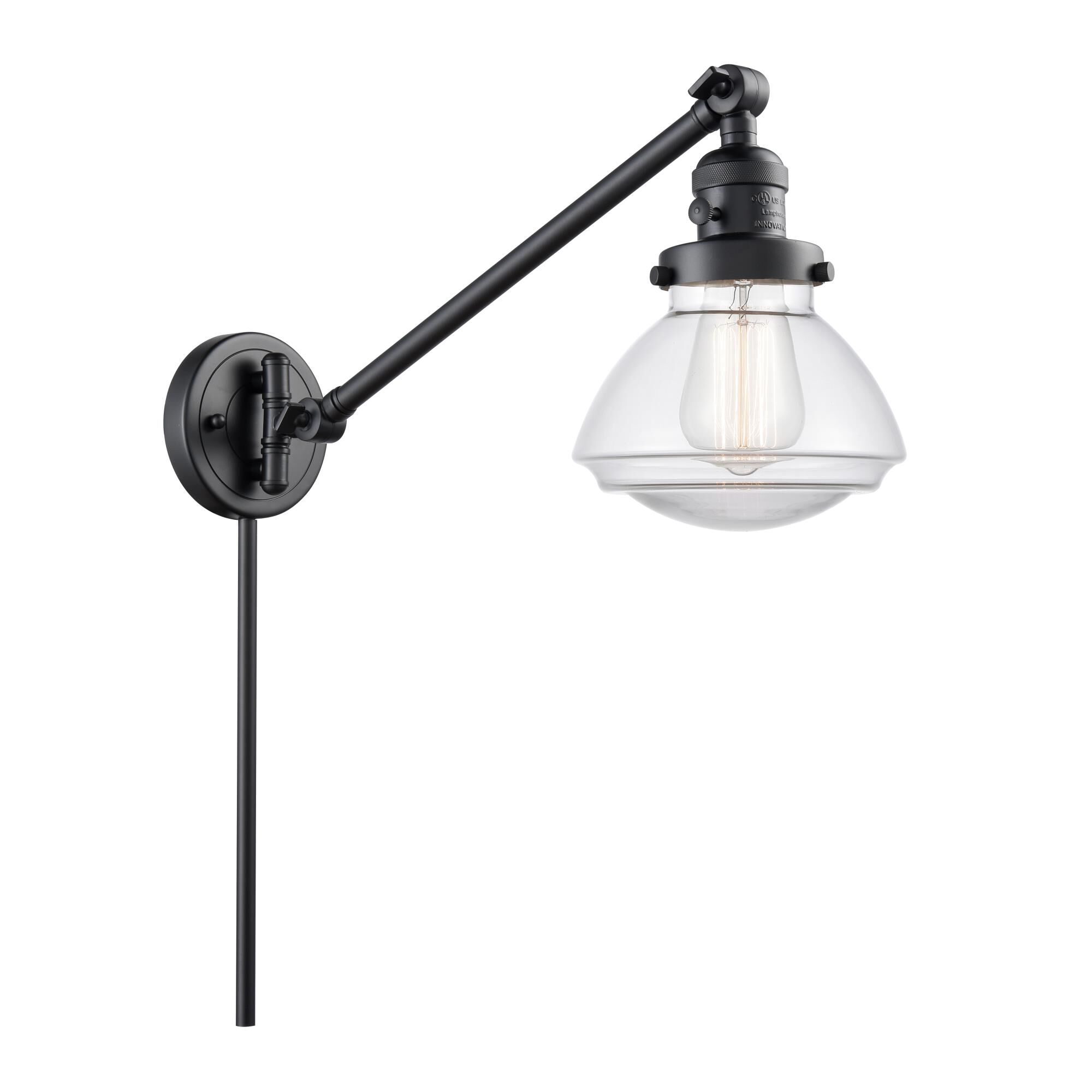Shown in Matte Black finish and Transparent  Clear Olean glass and Bulb Tint - Amber accent