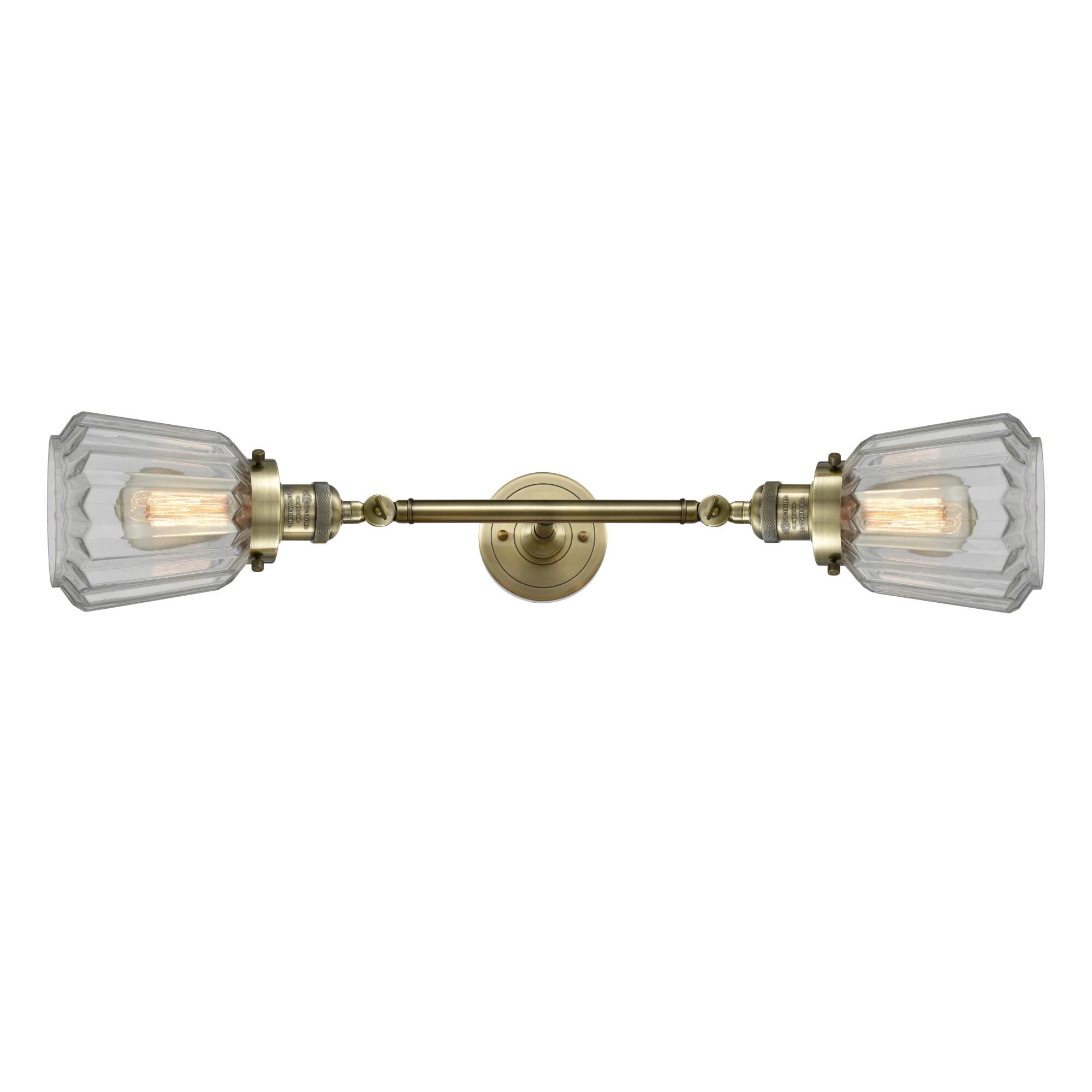 Shown in Antique Brass finish and Clear glass