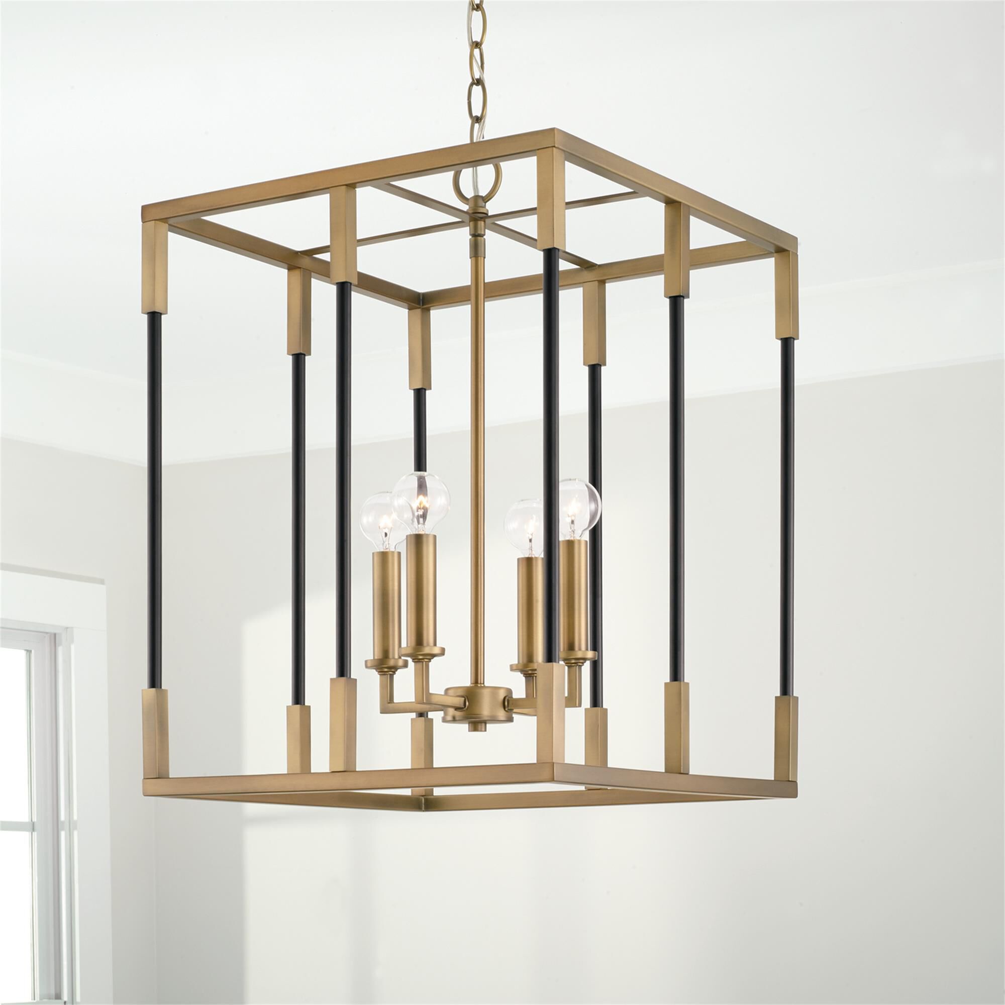 Shown in Aged Brass and Black finish