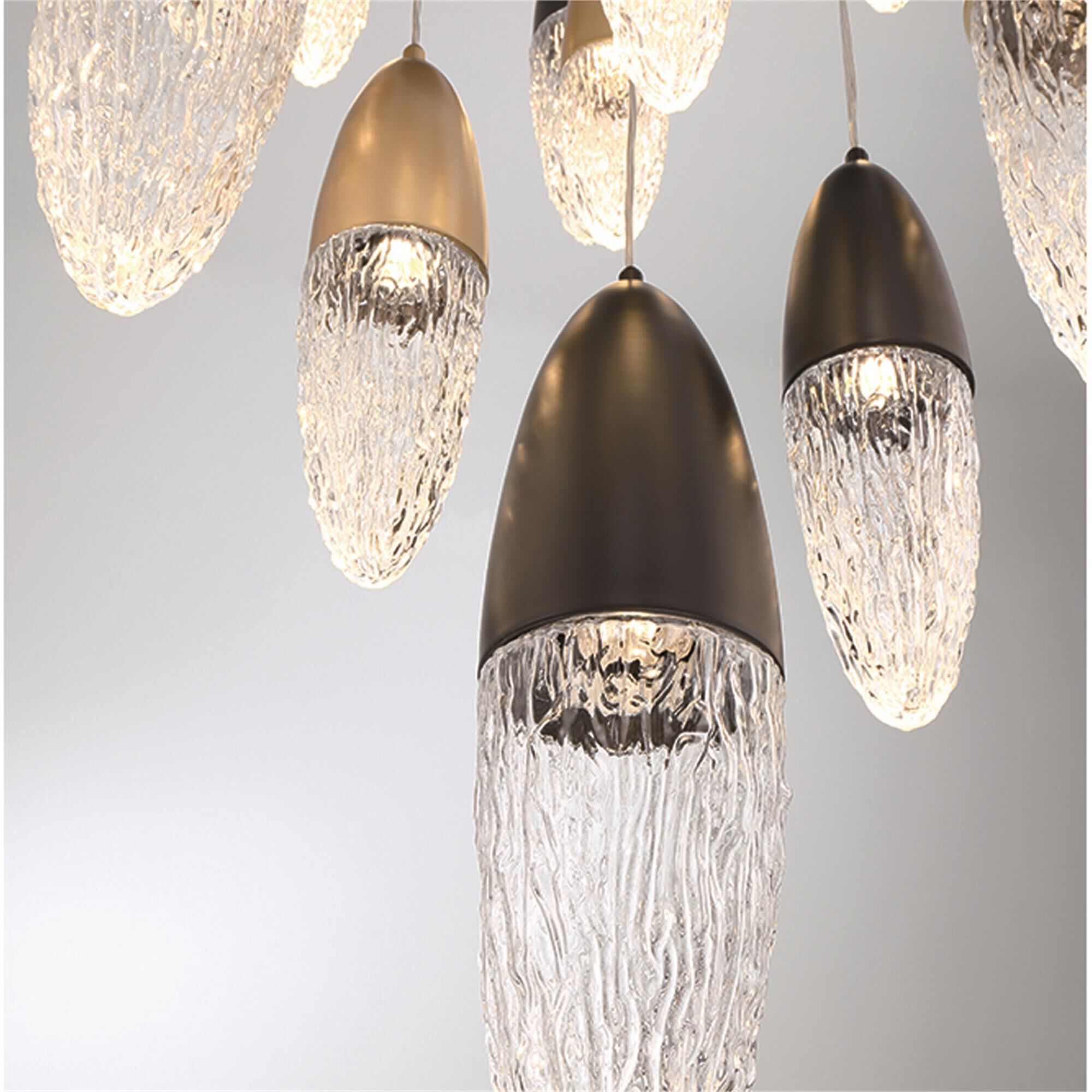 Shown in Mixed Black And Brass finish and Glass shade