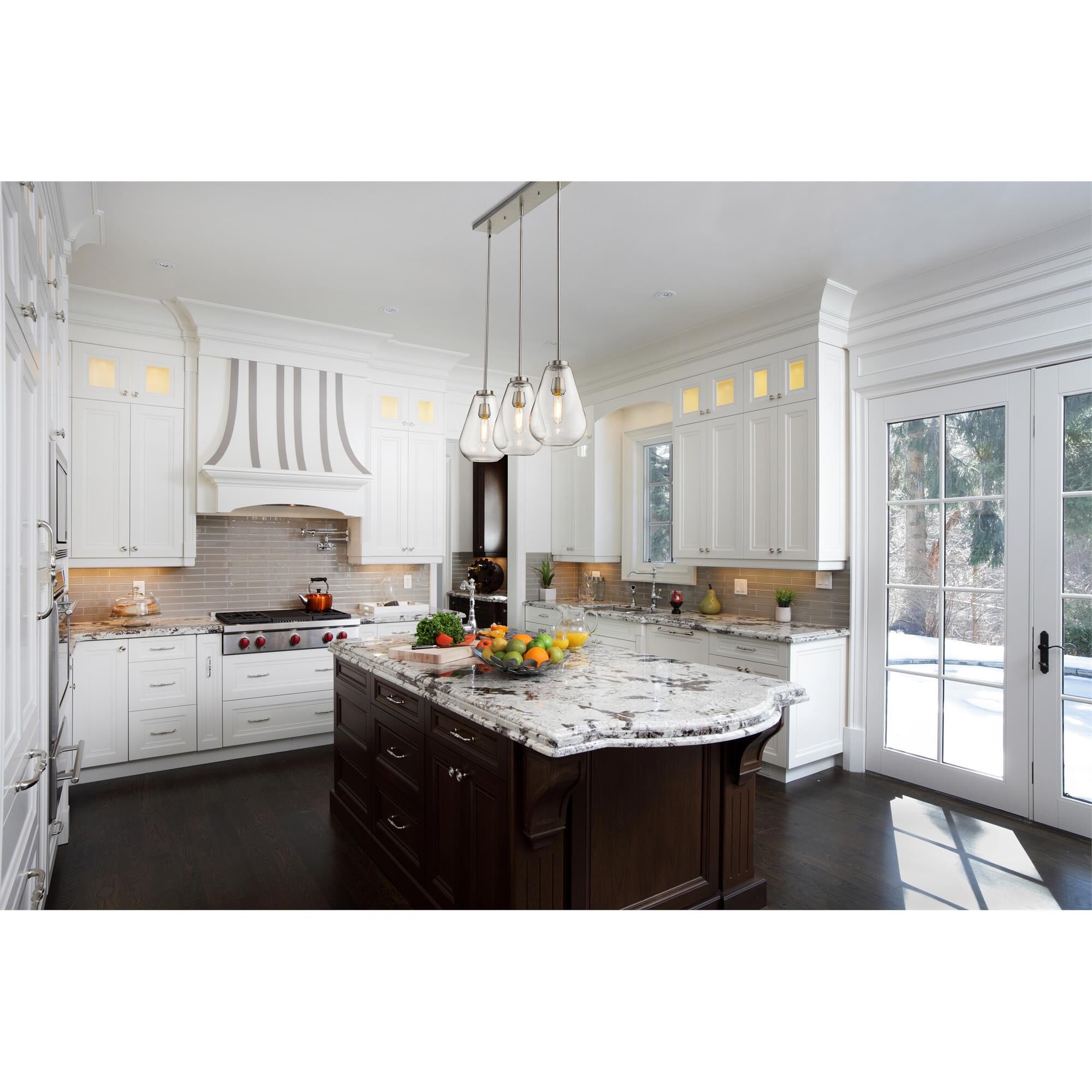 Shown in Brushed Nickel finish and Glass shade