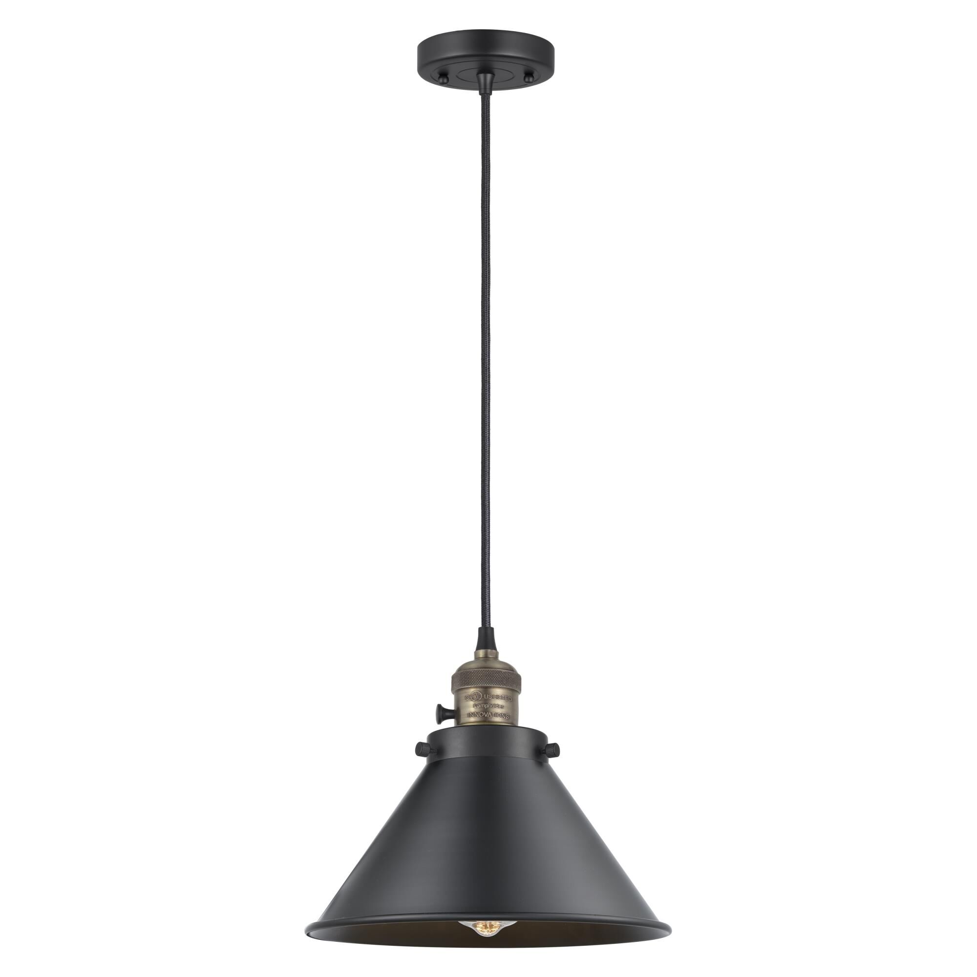 Shown in Black Antique Brass finish and Matte Black shade
