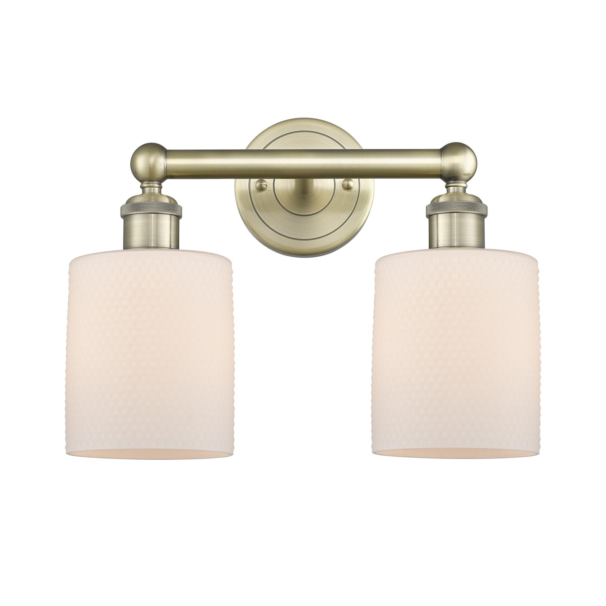 Shown in Antique Brass finish and Matte White glass