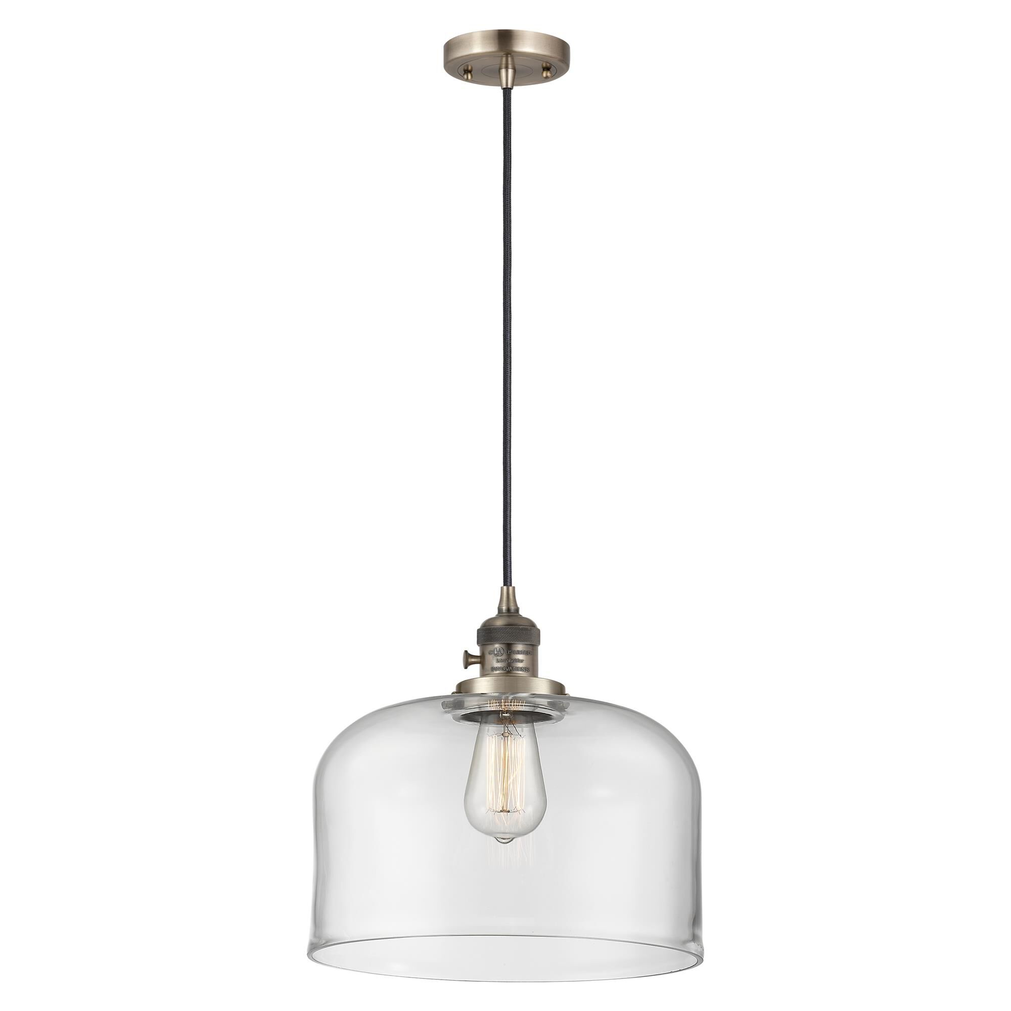 Shown in Antique Brass finish and Clear glass