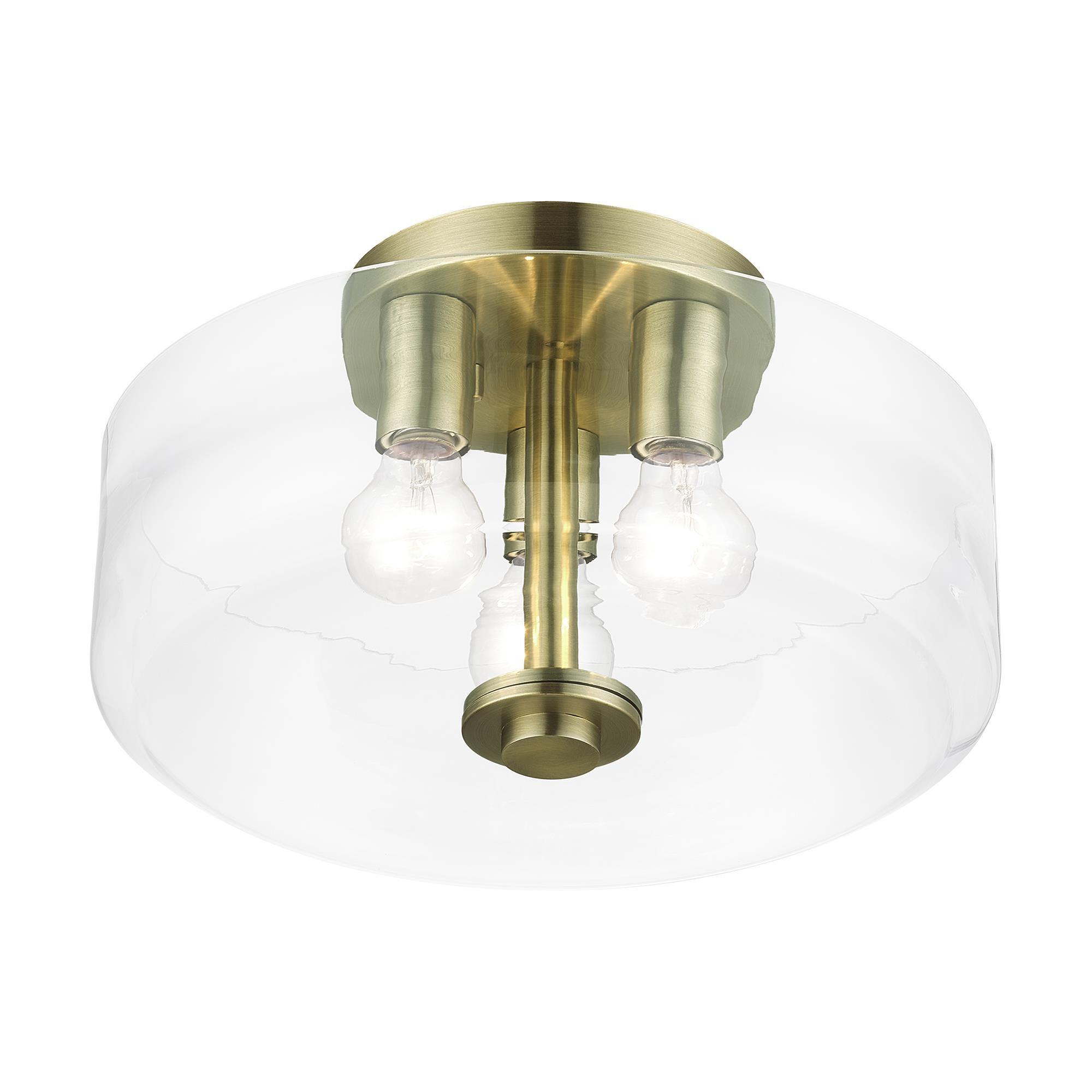 Shown in Antique Brass finish and Mouth Blown Clear glass