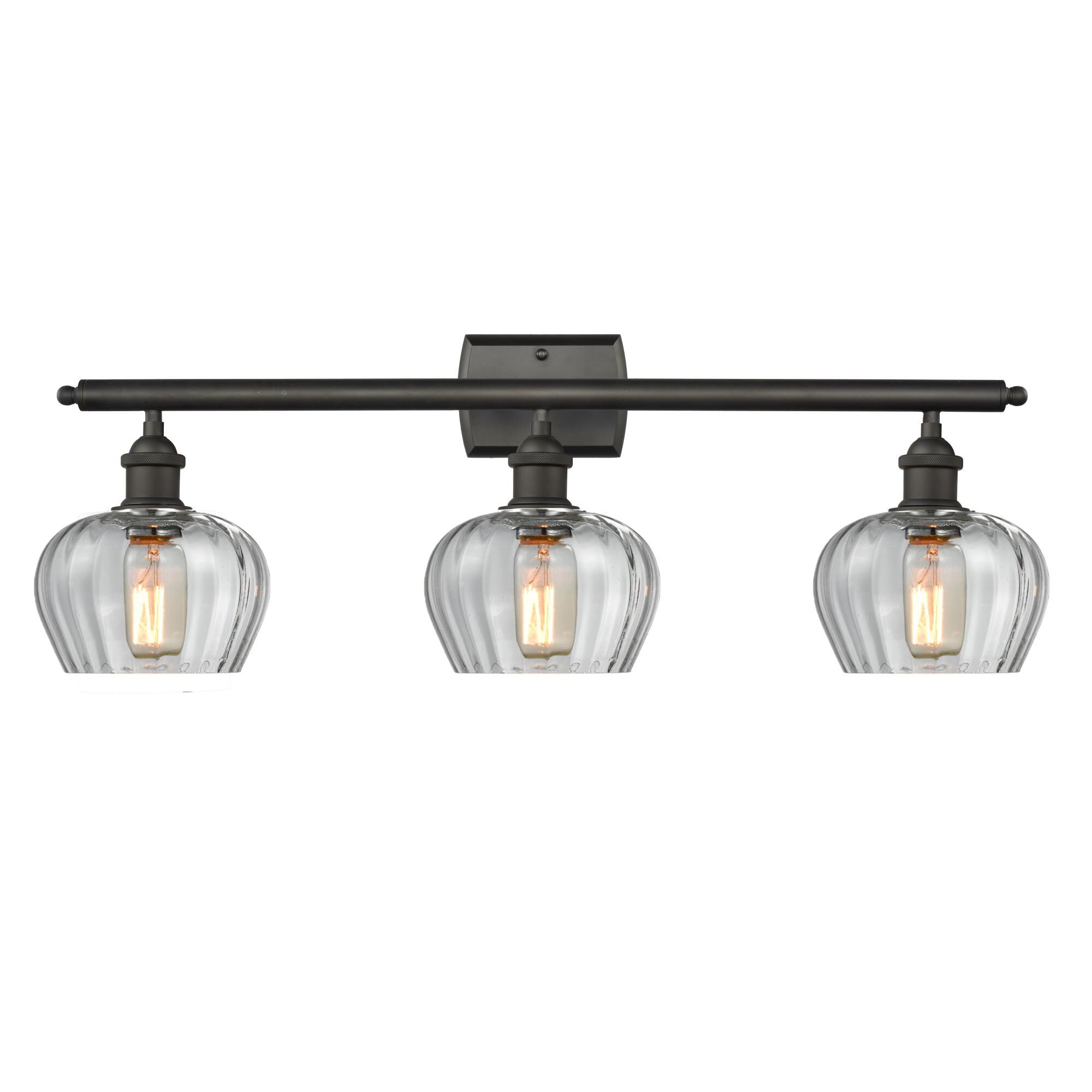 Shown in Oil Rubbed Bronze finish and Clear Fluted glass