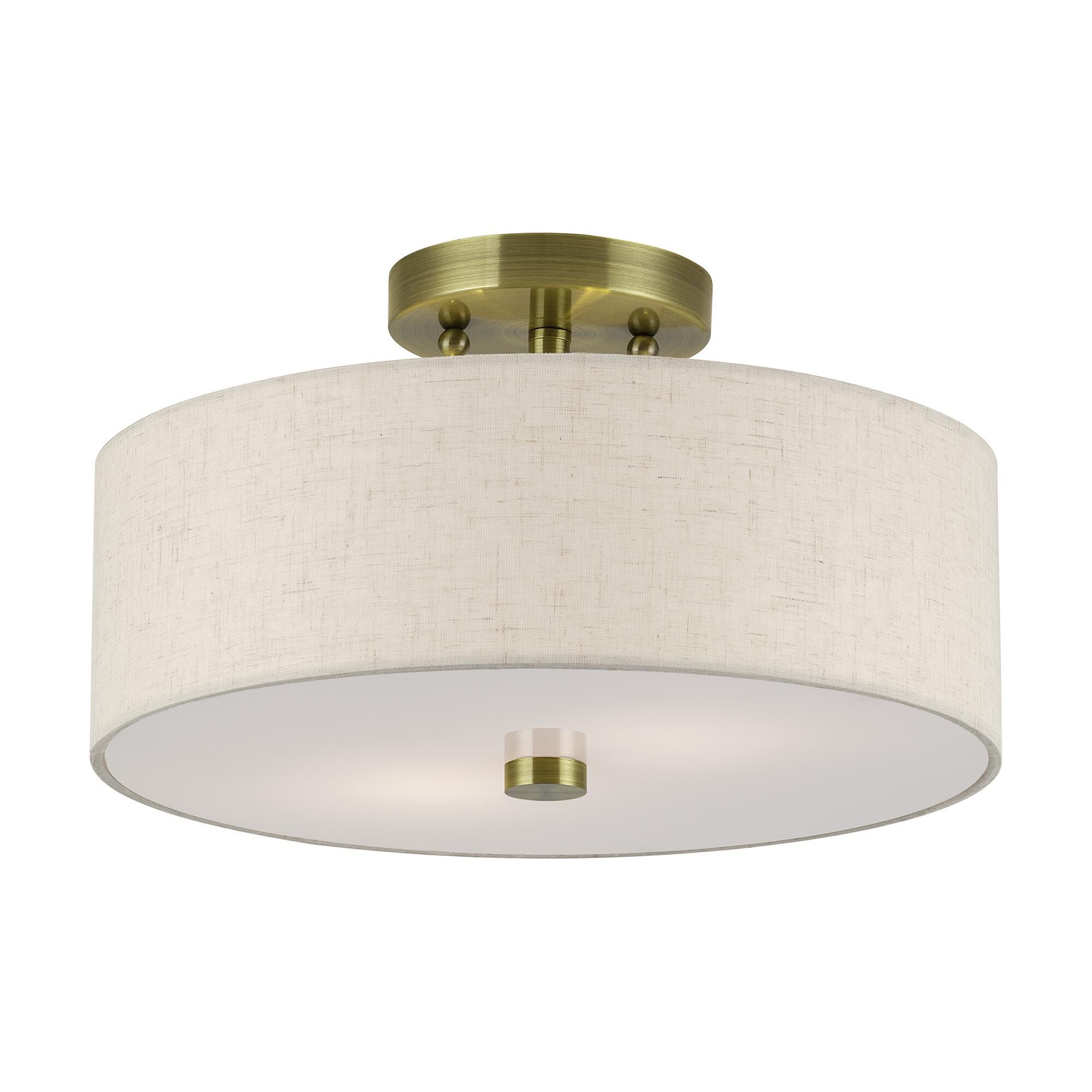 Shown in Antique Brass finish and Hand Crafted Oatmeal Color Fabric with White Color Inside shade