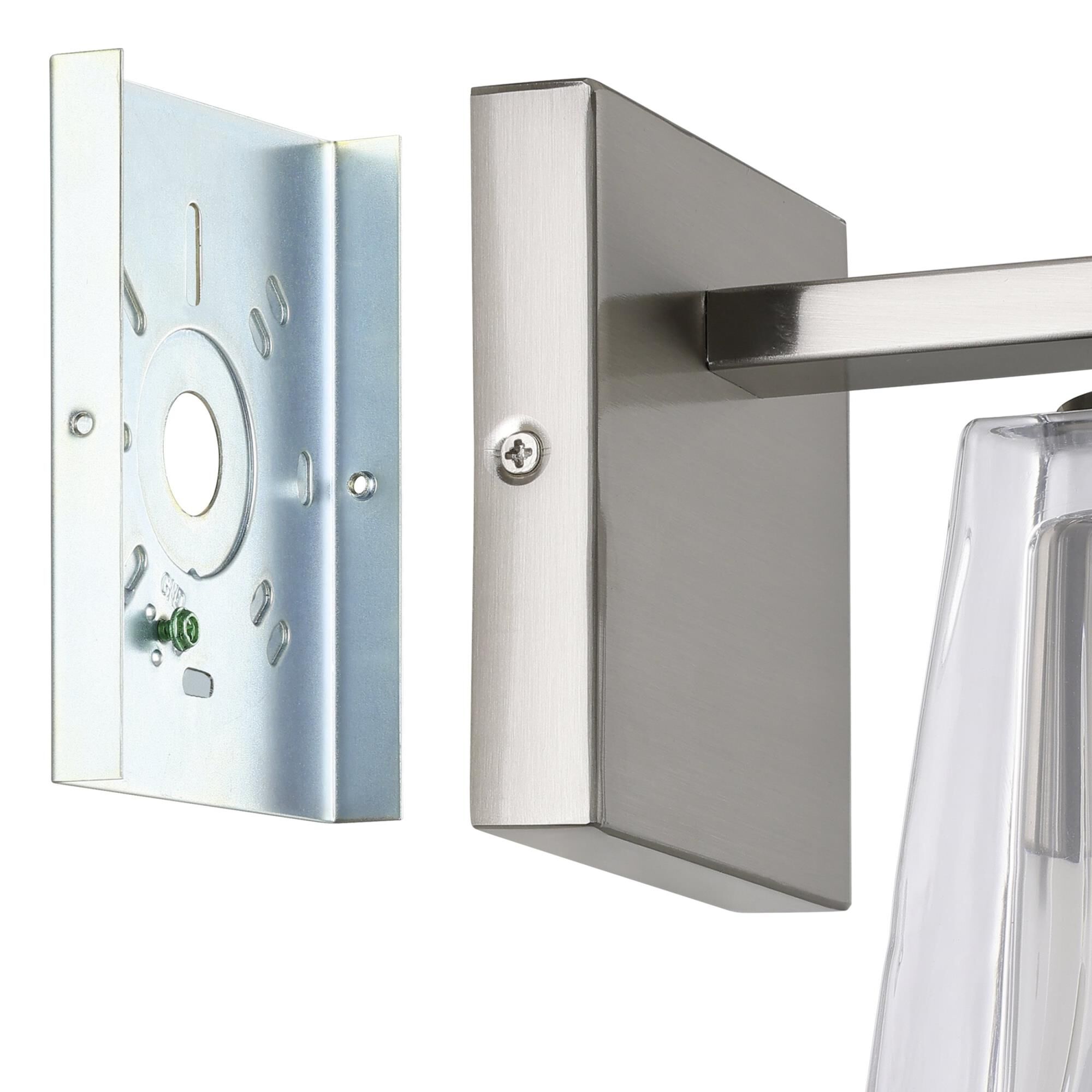 Shown in Brushed Nickel finish and Clear Pressed glass