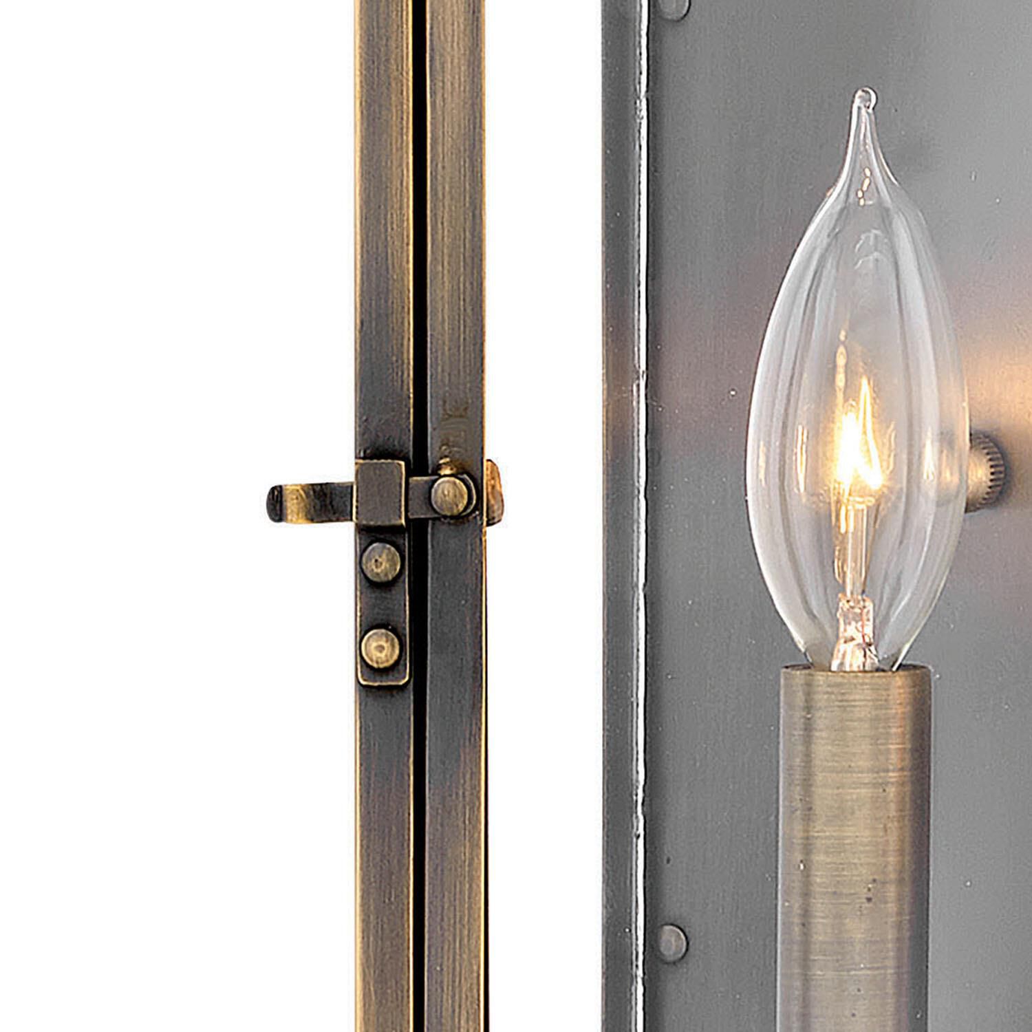 Shown in Dark Antique Brass finish and Clear glass