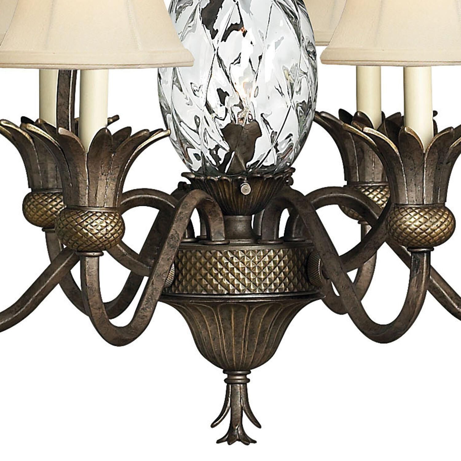Shown in Pearl Bronze finish and Clear Optic glass and Ivory Silk shade