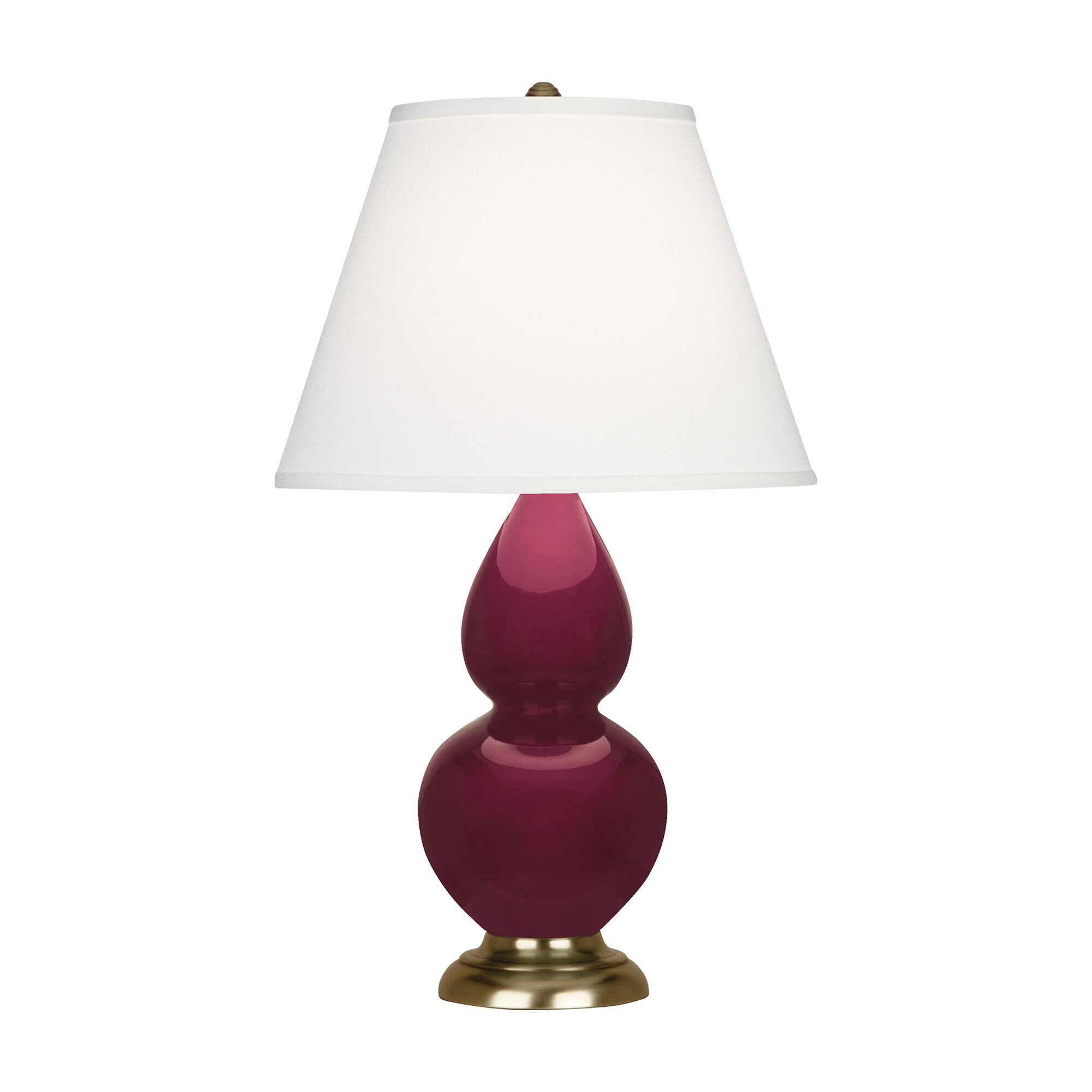 Shown in Sugar Plum finish and Pearl Dupioni shade and Antique Brass accent