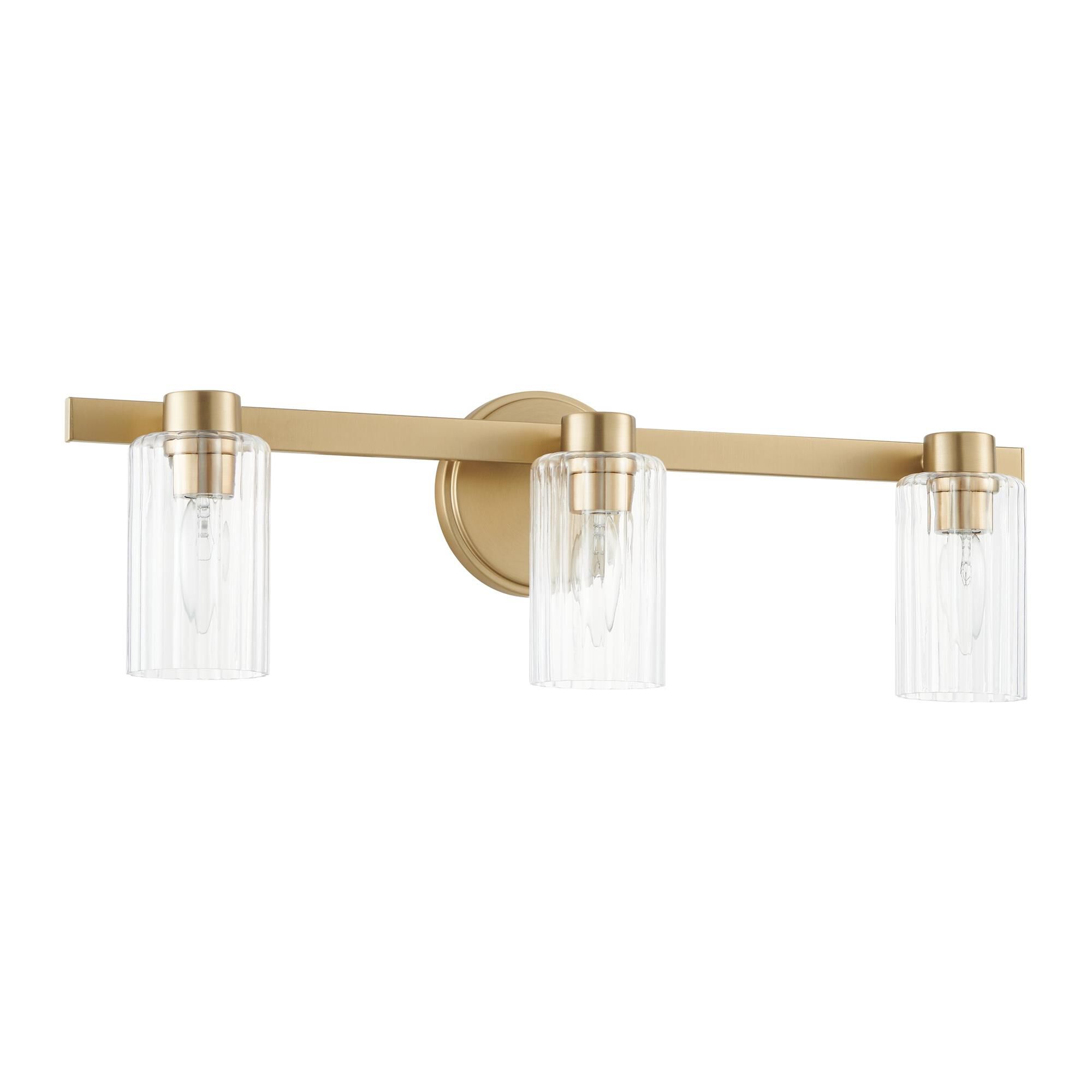 Shown in Champagne Gold finish and Clear Ribbed glass