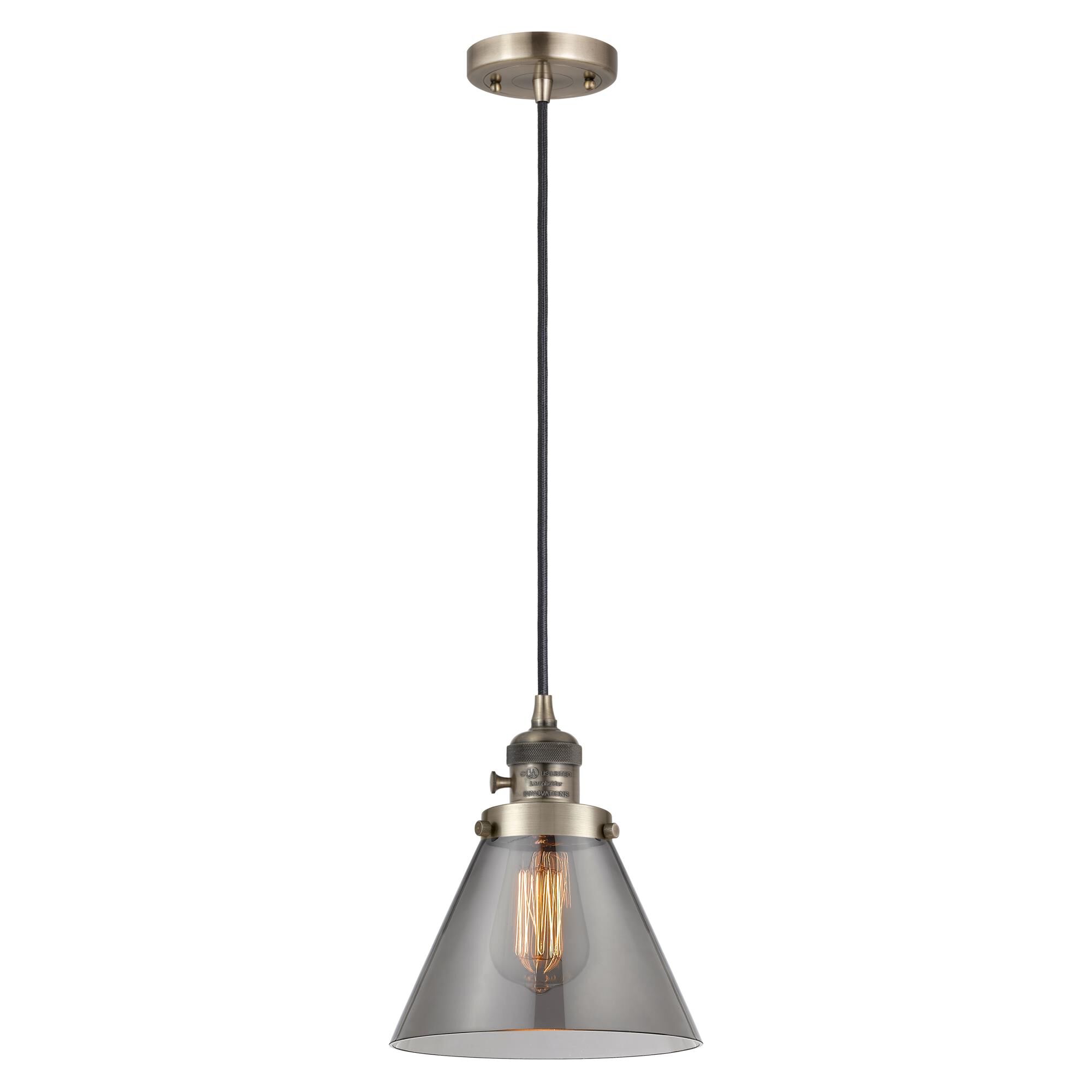 Shown in Antique Brass finish and Plated Smoke glass