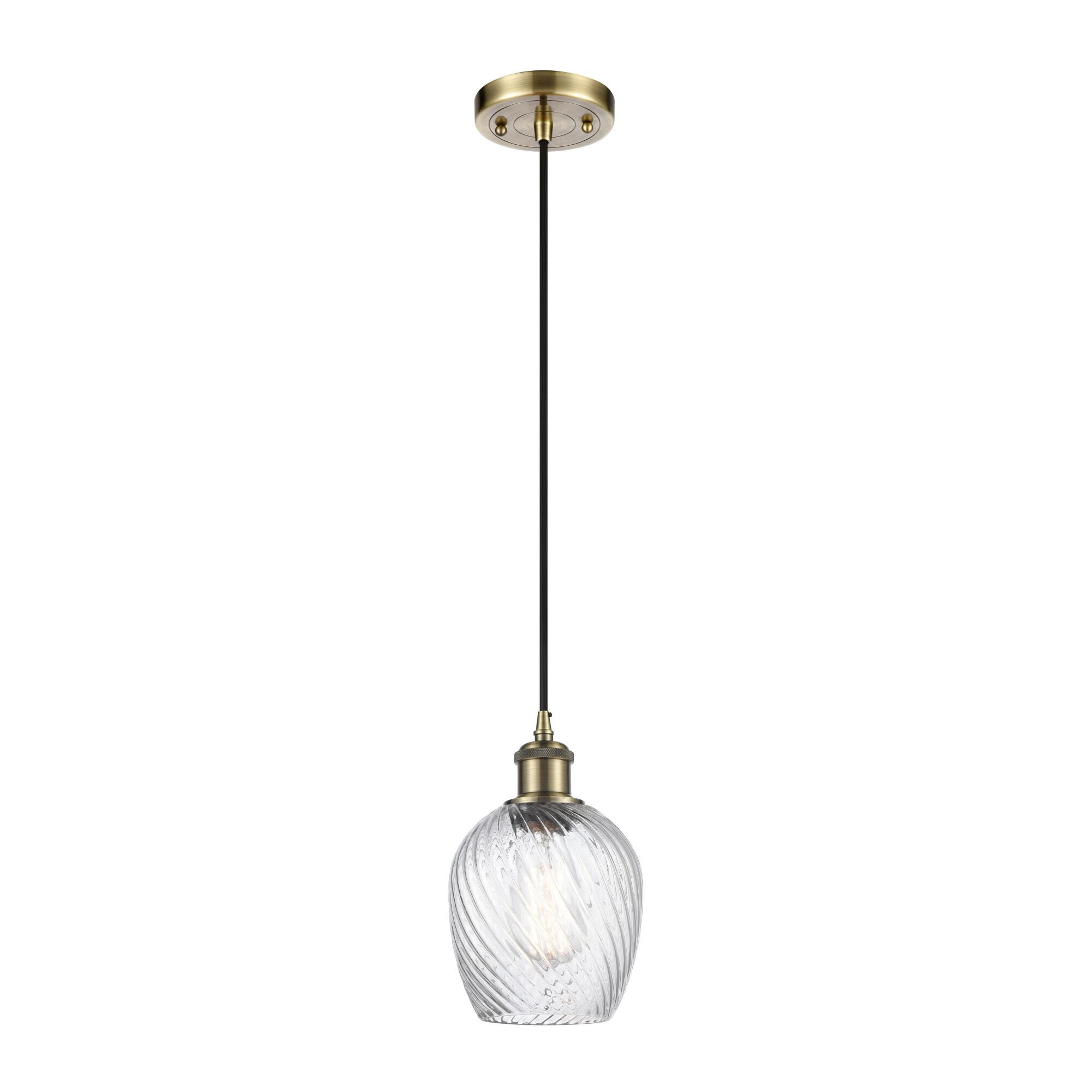 Shown in Antique Brass finish and Globe glass and Glass shade