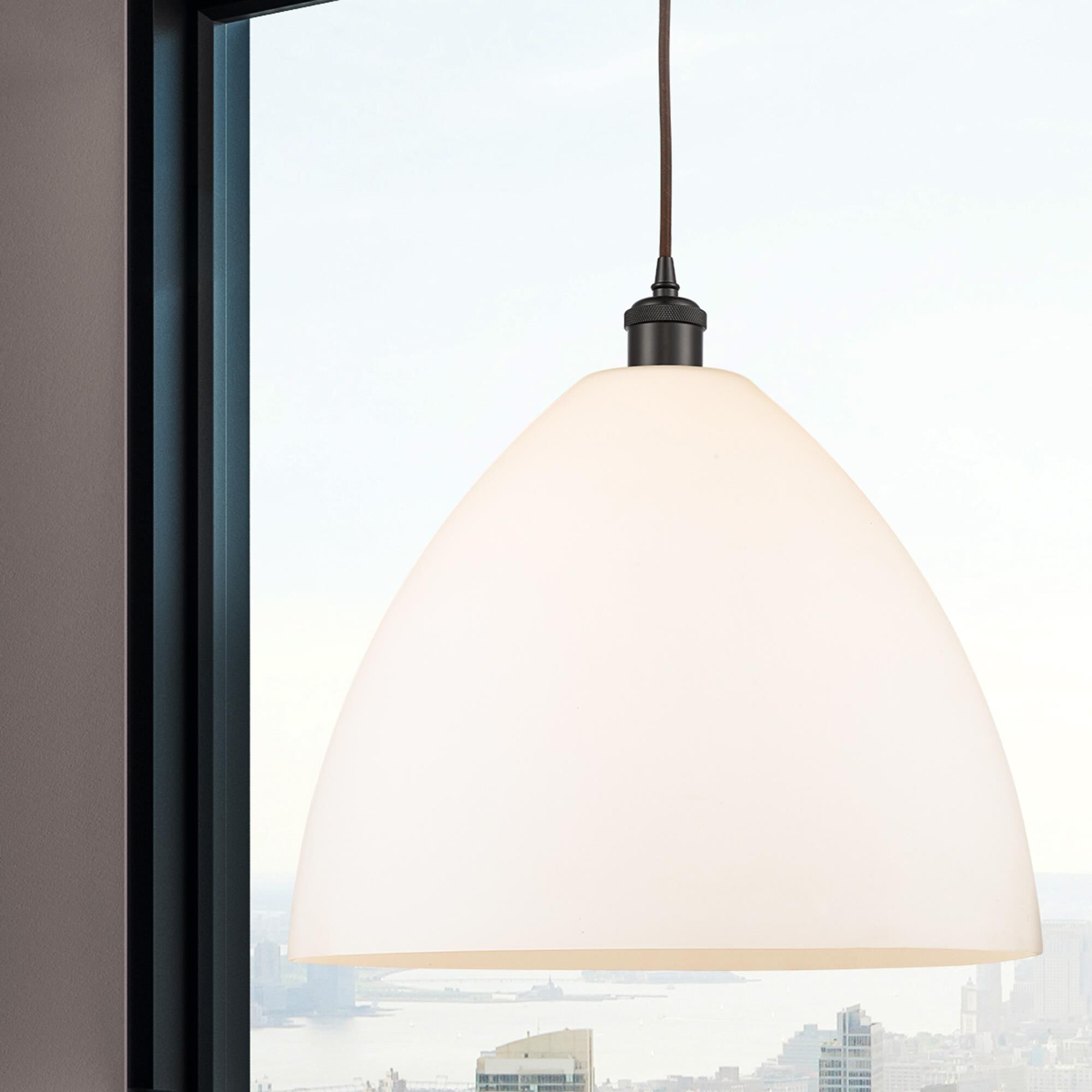 Shown in Oil Rubbed Bronze finish and Matte White glass