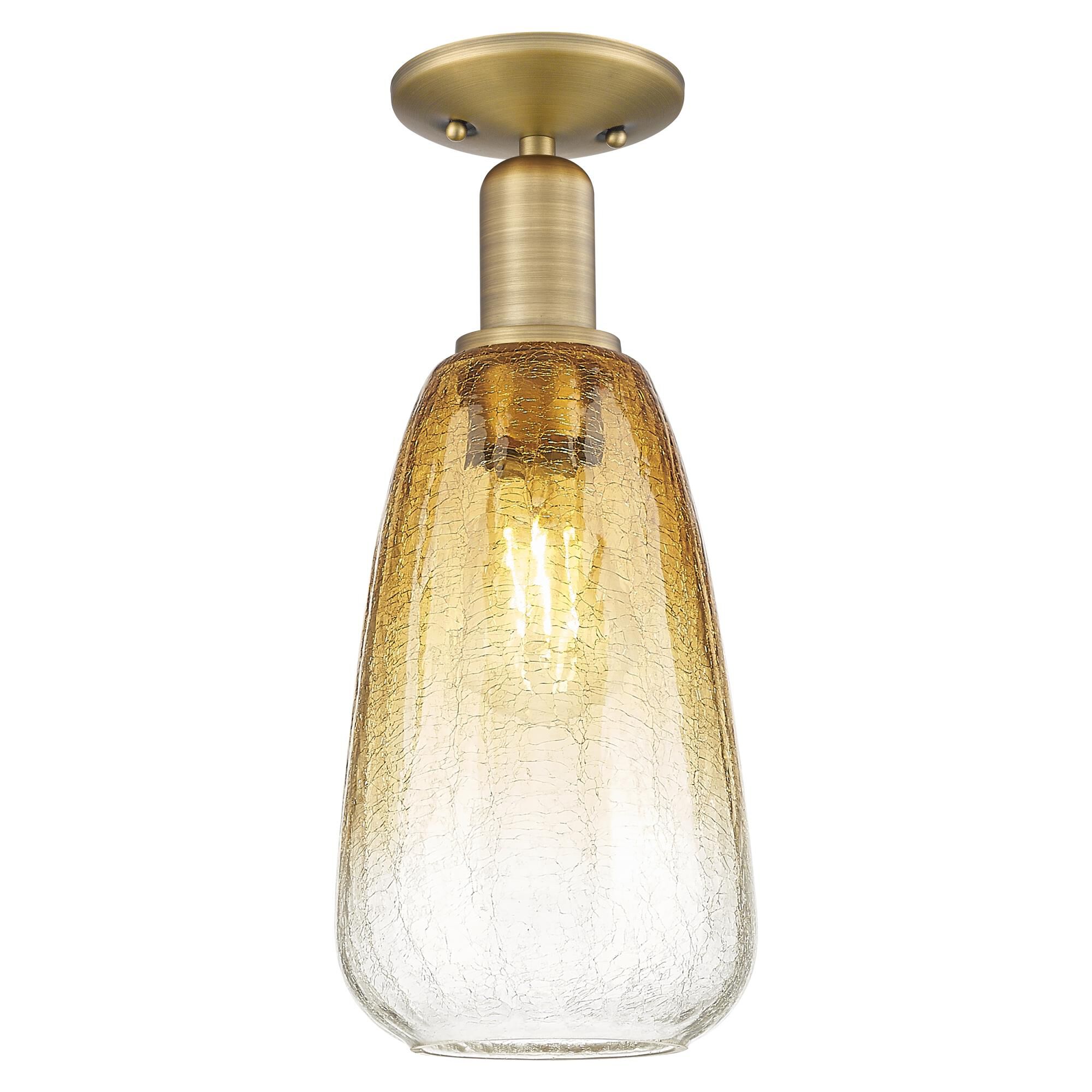 Shown in Brushed Brass finish and Amber glass