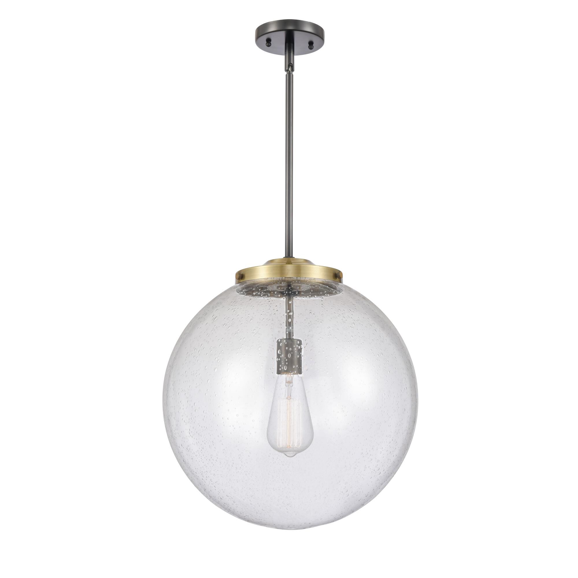 Shown in Black Antique Brass finish and Seedy Beacon glass