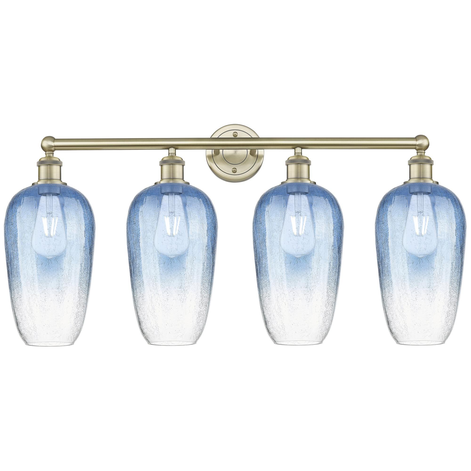 Shown in Antique Brass finish and Sapphire Blue glass