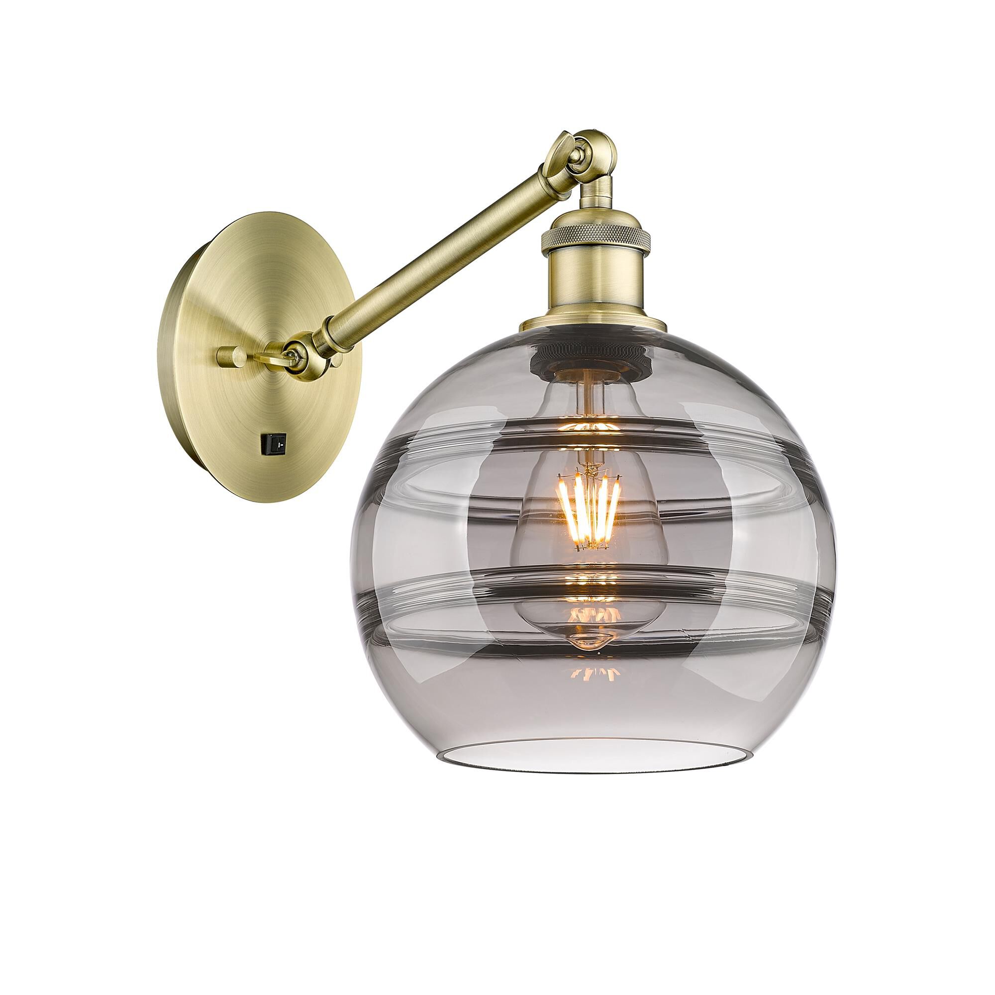 Shown in Antique Brass finish and Light Smoke glass