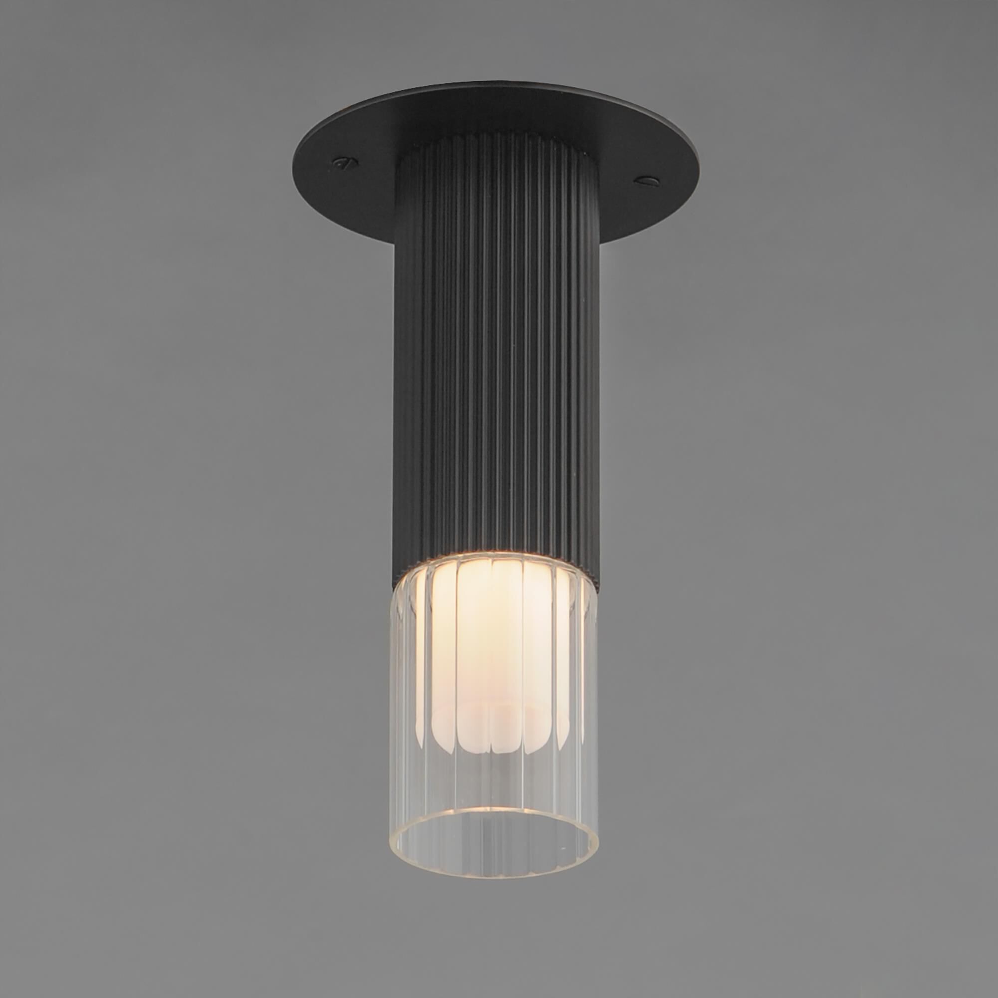 Shown in Black finish and Clear Ribbed glass