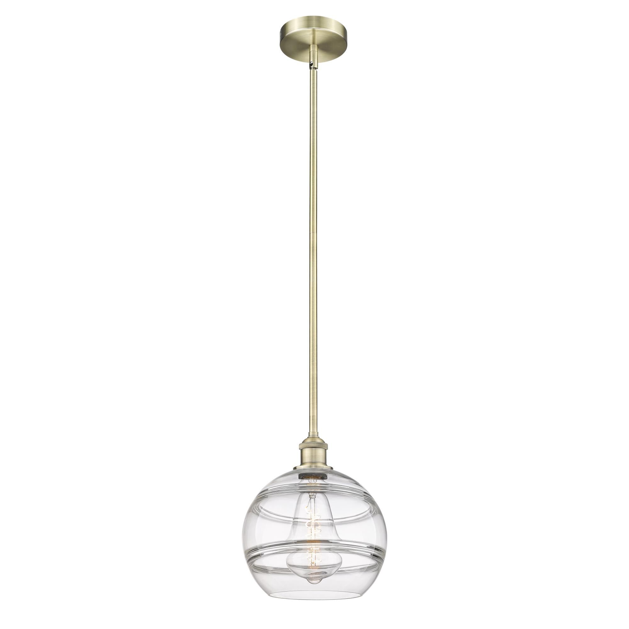 Shown in Antique Brass finish and Clear glass