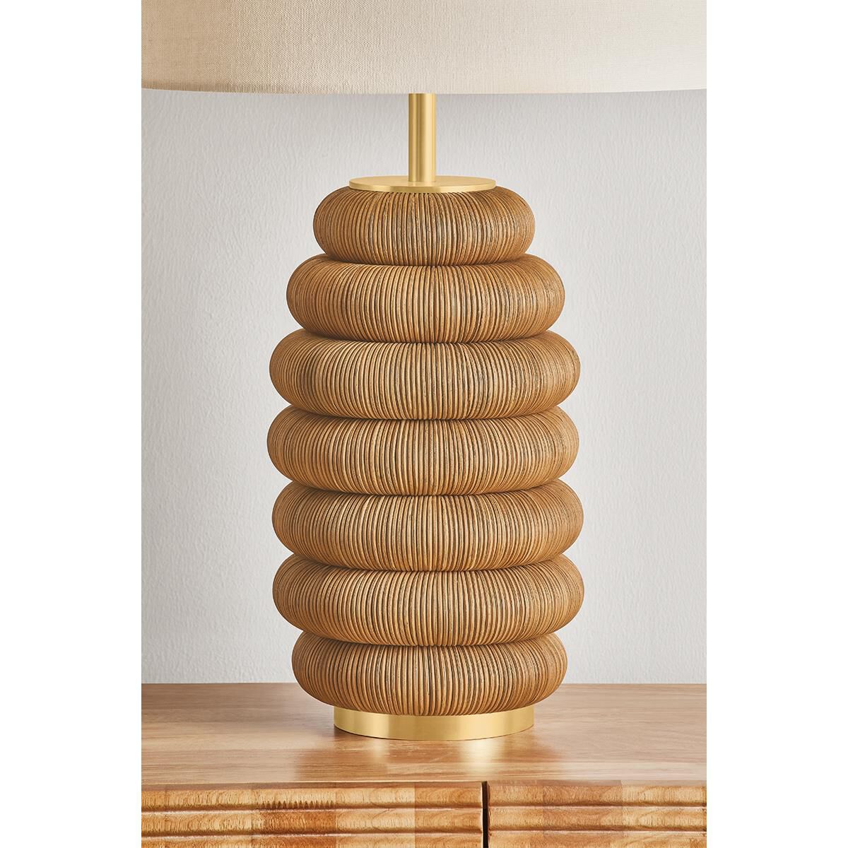 Shown in Aged Brass finish and White Linen shade