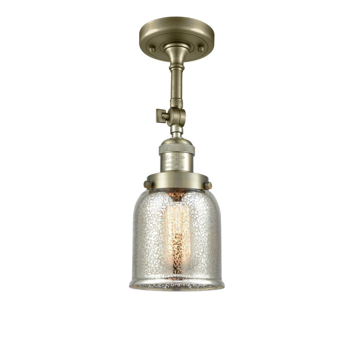 Shown in Antique Brass finish and Silver Mercury glass and None accent
