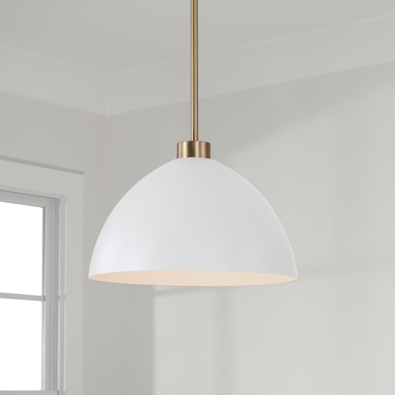 Shown in Aged Brass And White finish and Matte White Metal shade