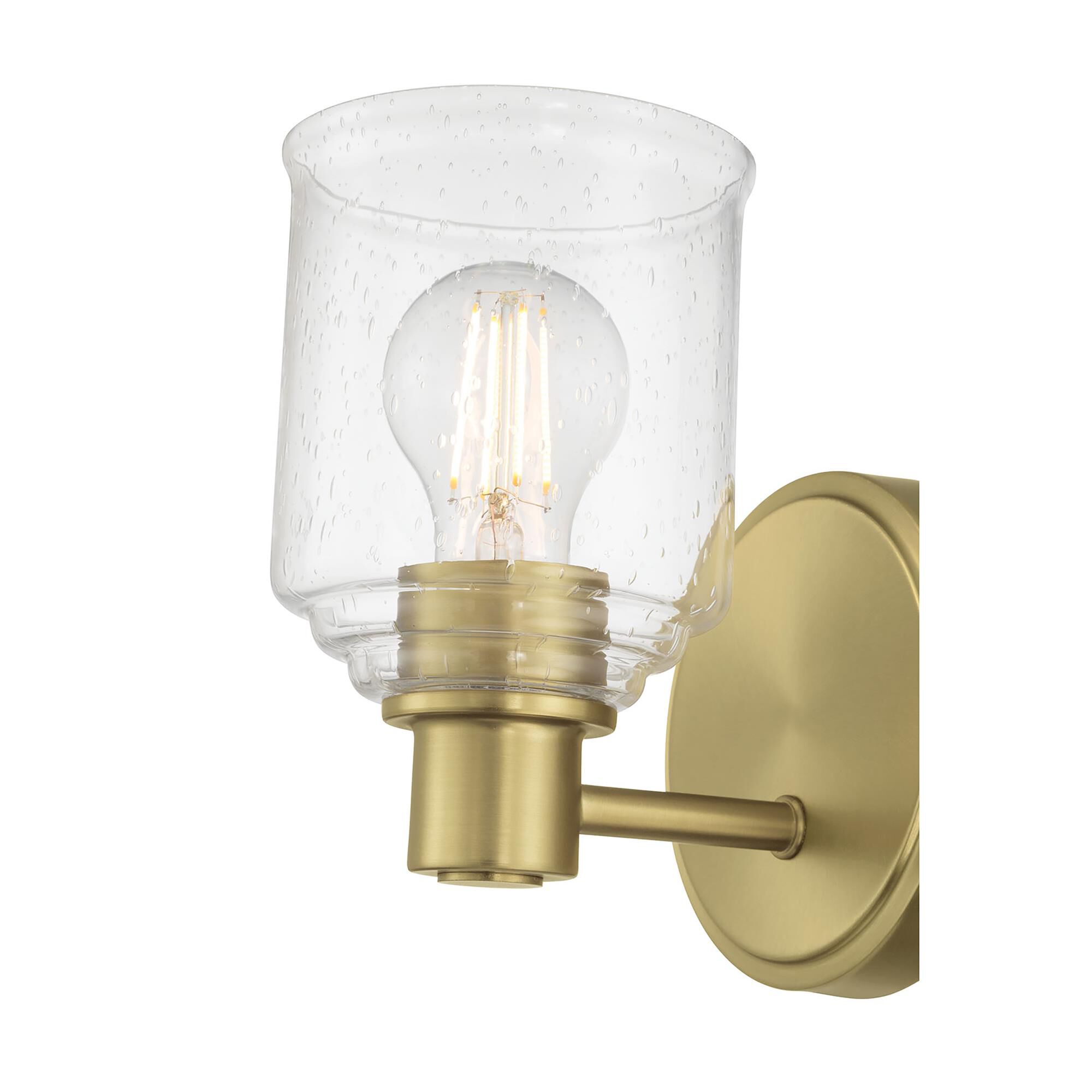 Shown in Vintage Brass finish and Clear Seeded glass