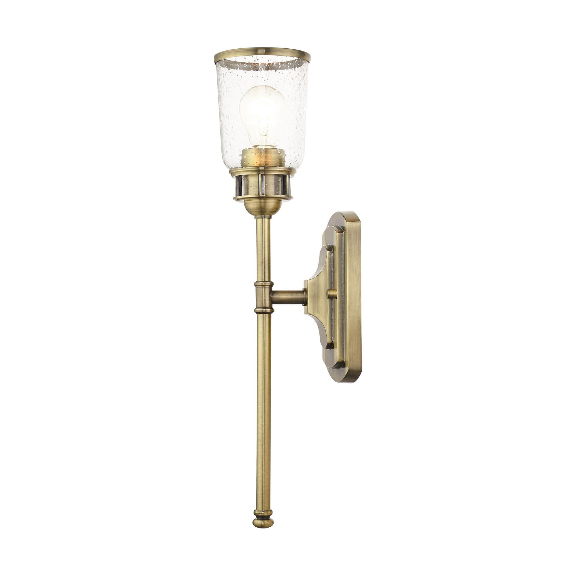 Shown in Antique Brass finish and Hand Blown Clear Seeded glass and Hand Blown Clear Seeded Glass shade