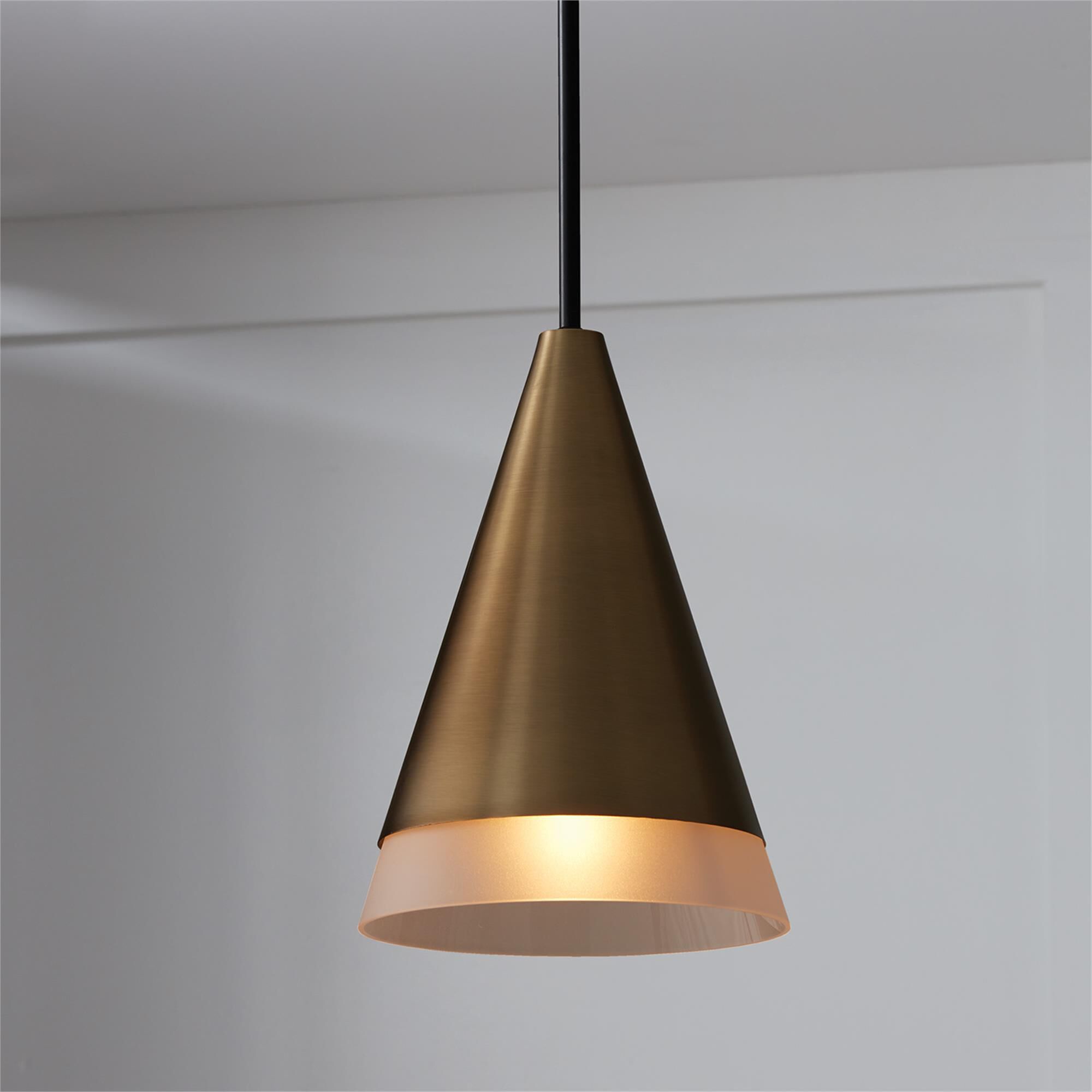 Shown in Aged Brass And Black finish and Frosted glass