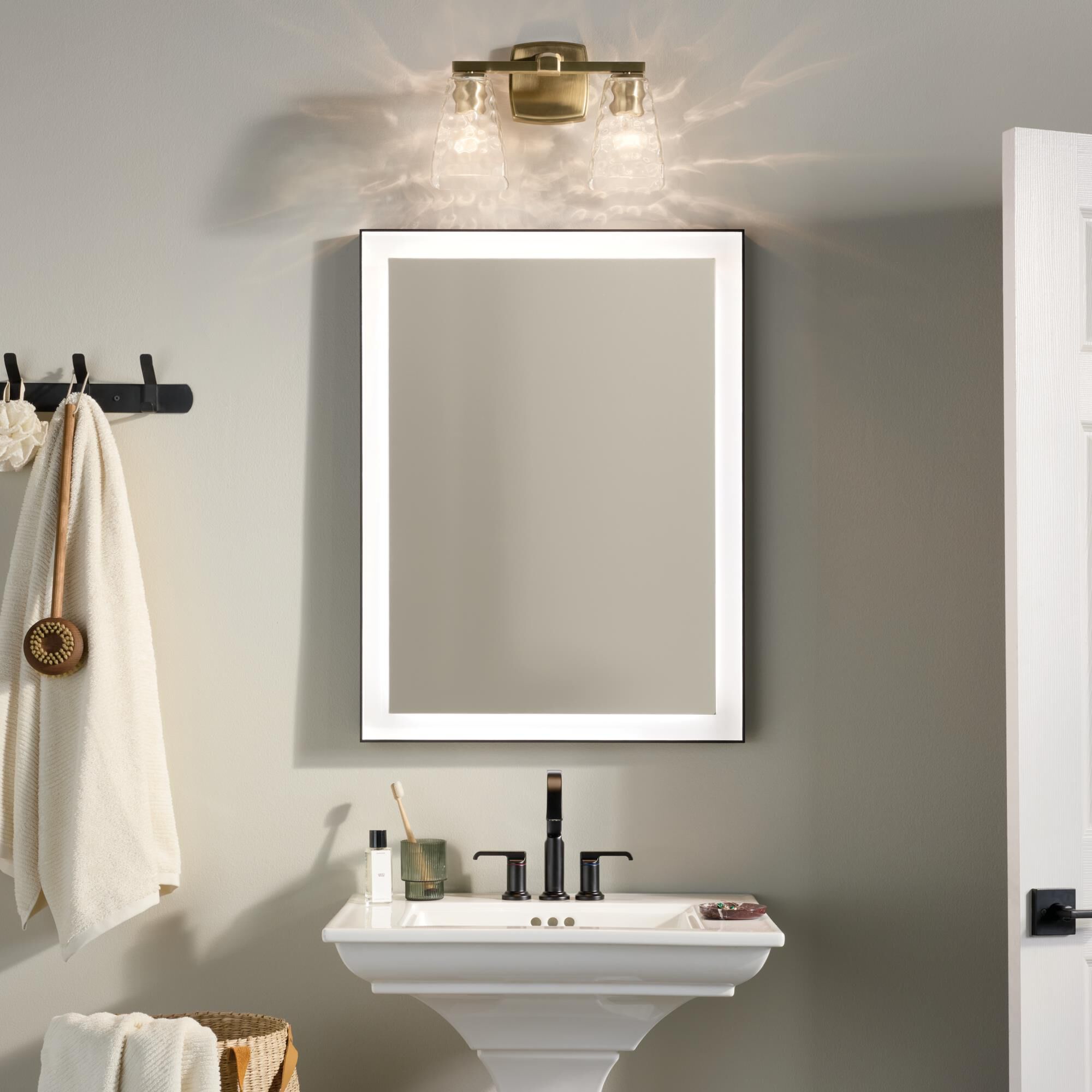 Shown in Champagne Bronze finish and Clear Water glass