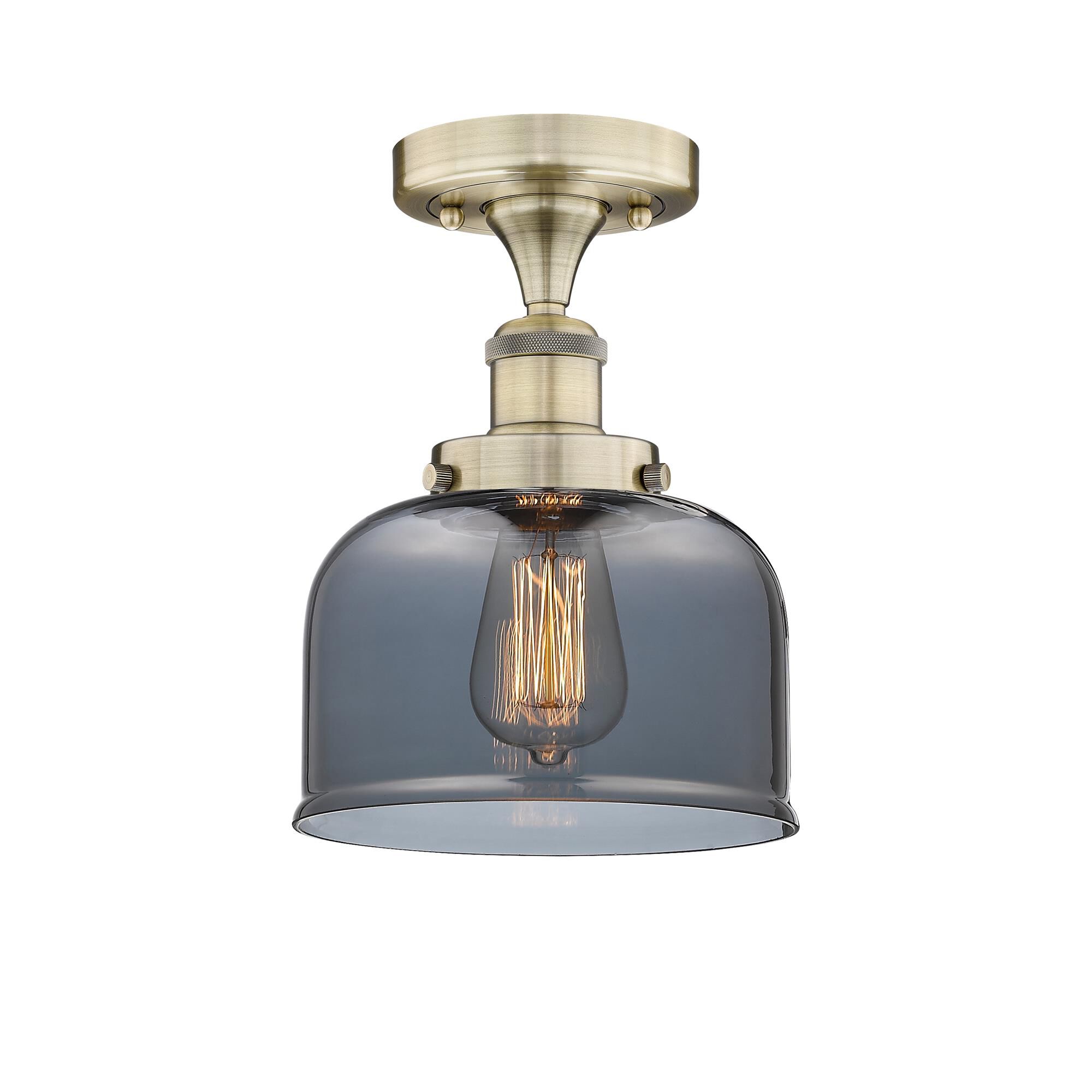 Shown in Antique Brass finish and Plated Smoke glass