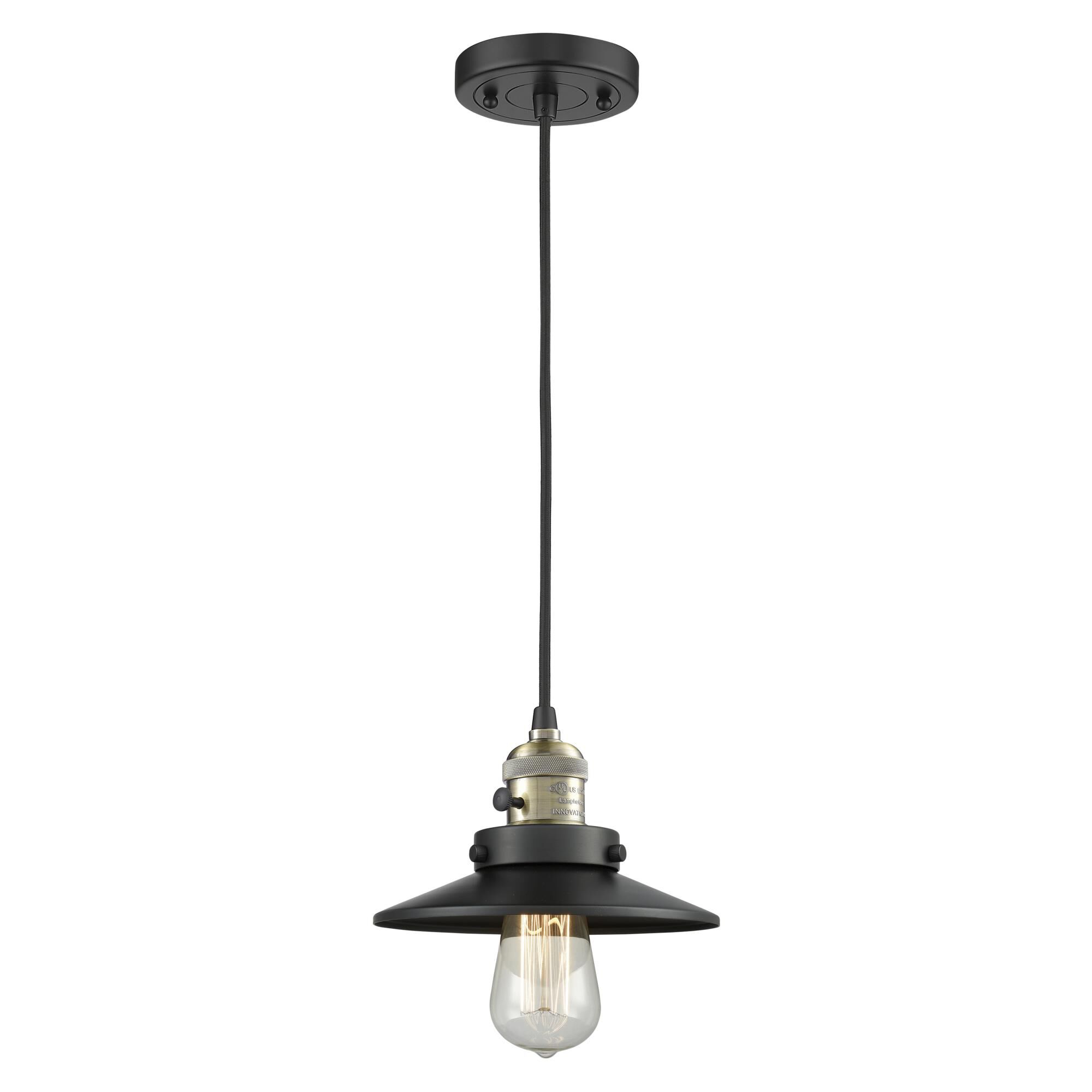Shown in Black Antique Brass finish and Matte Black shade